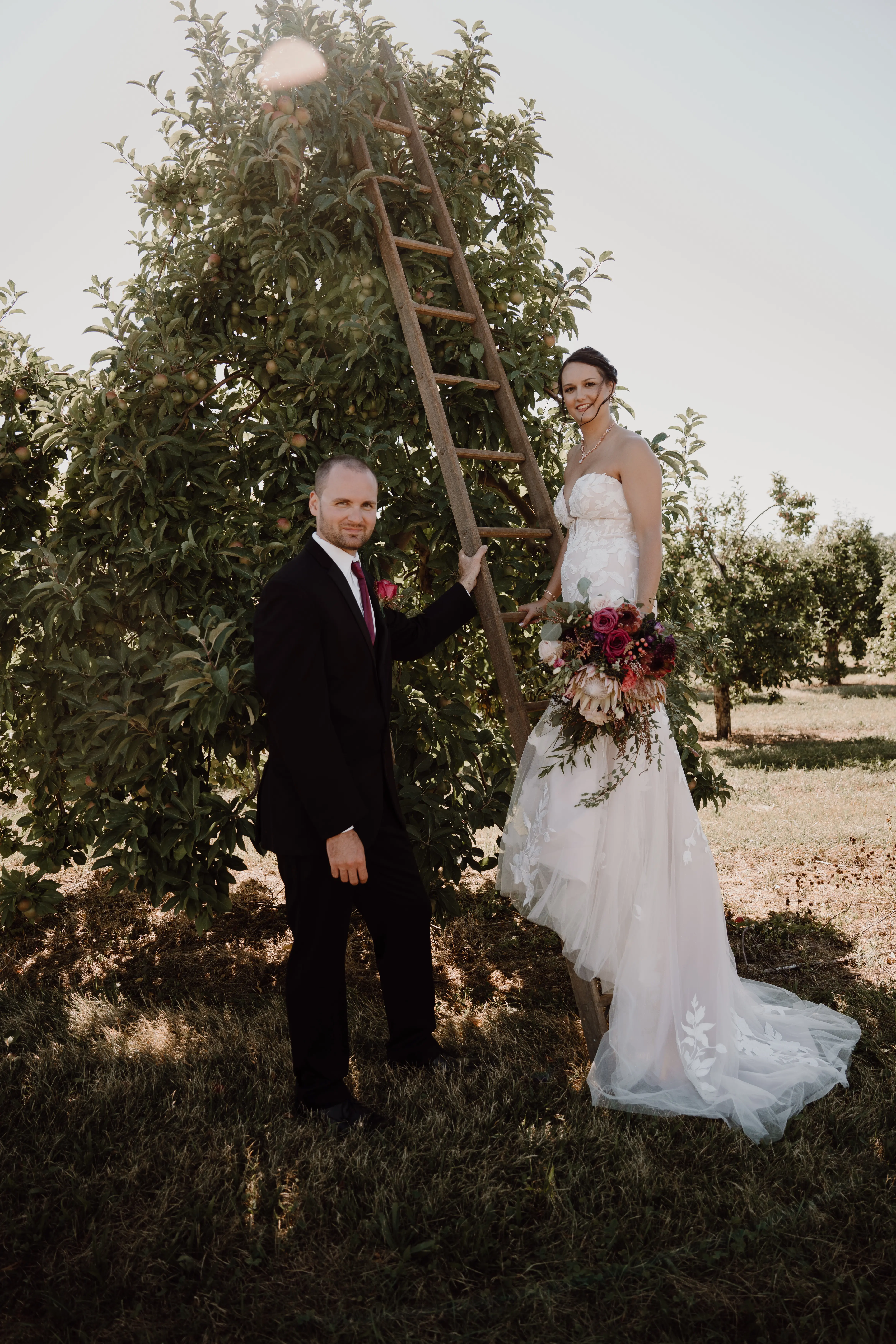 Groom With Bride Wearing Mermaid Wedding Dress With Oversized Lace Hattie By Rebecca Ingram