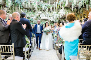 Beautiful Bride Walking Down The Aisle Wearing Flattering Satin Ball Gown Called Selena By Maggie Sottero