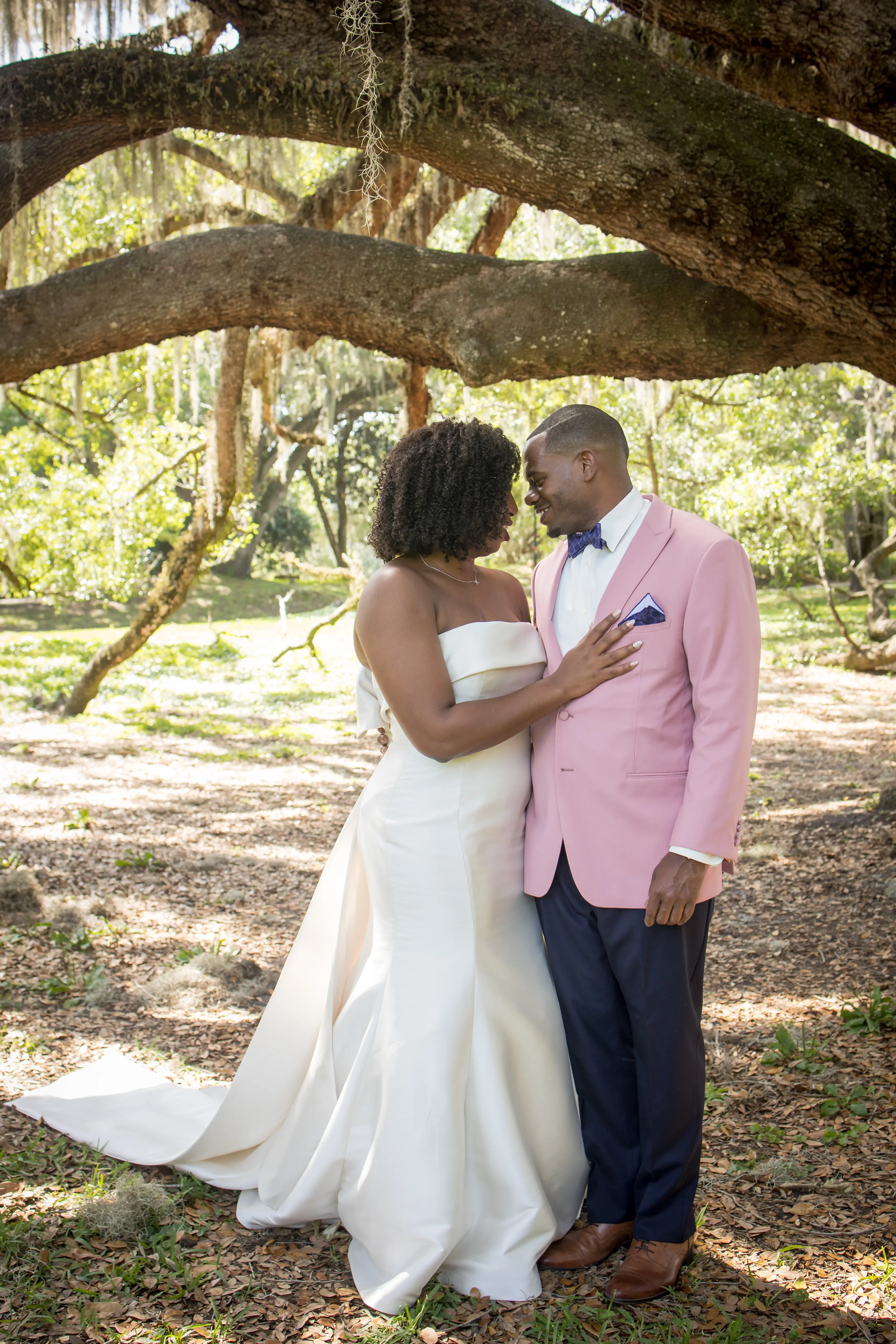 Groom With Bride In Strapless Mermaid Wedding Dress Named Mitchell By Maggie Sottero