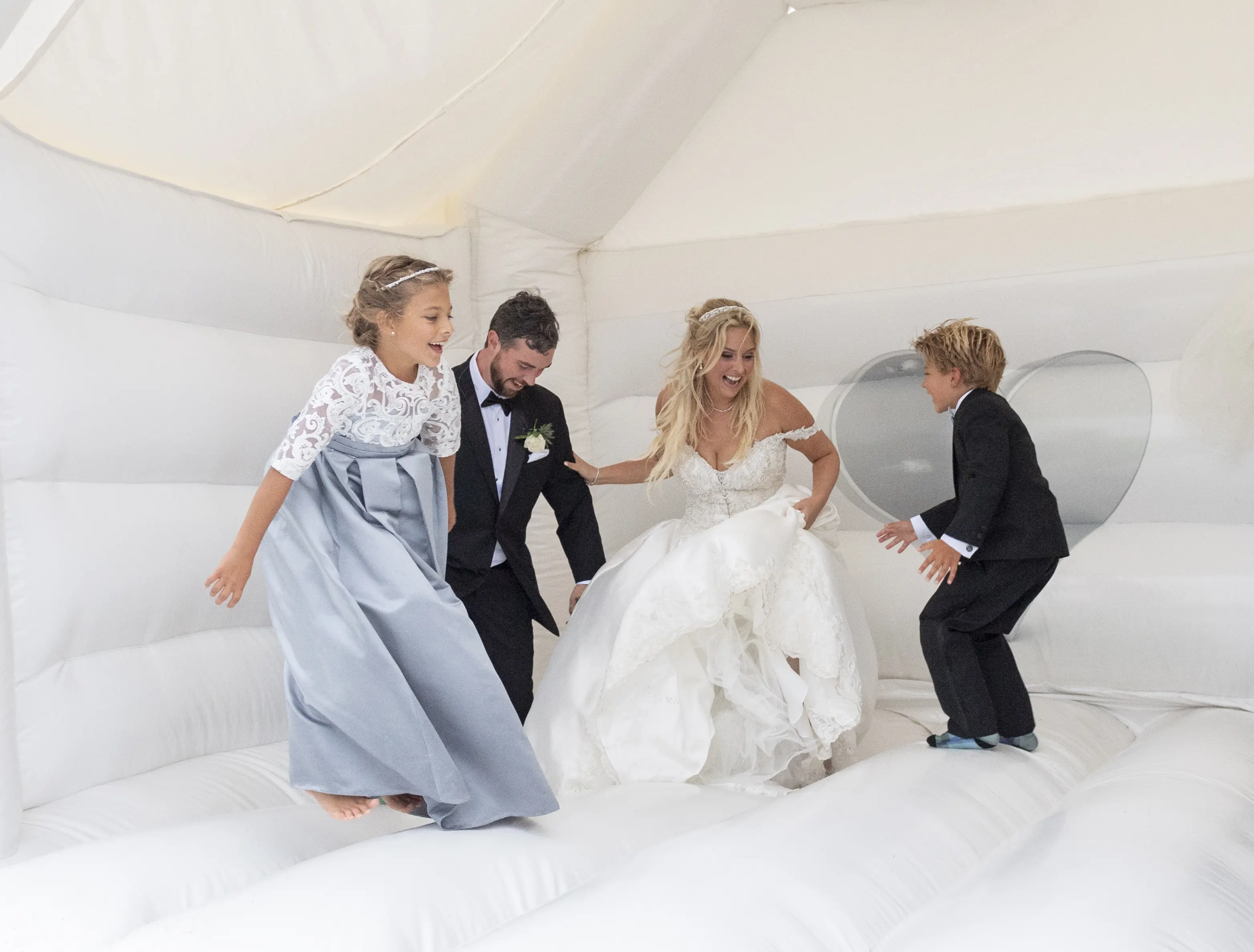 Bride In Satin Wedding Dress Called Kimora By Sottero And Midgley With Groom