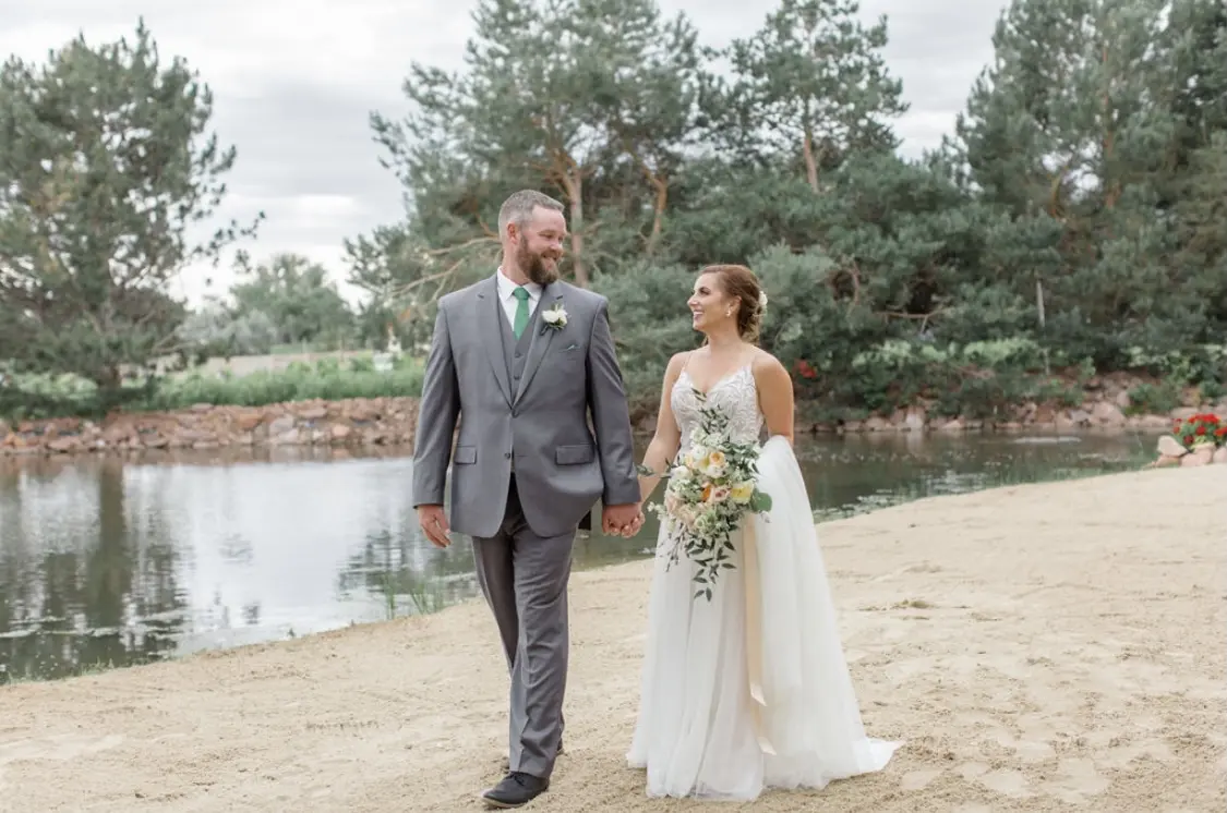 Groom With Bride Wearing Relaxed A-Line Wedding Dress Called Charlene By Maggie Sottero