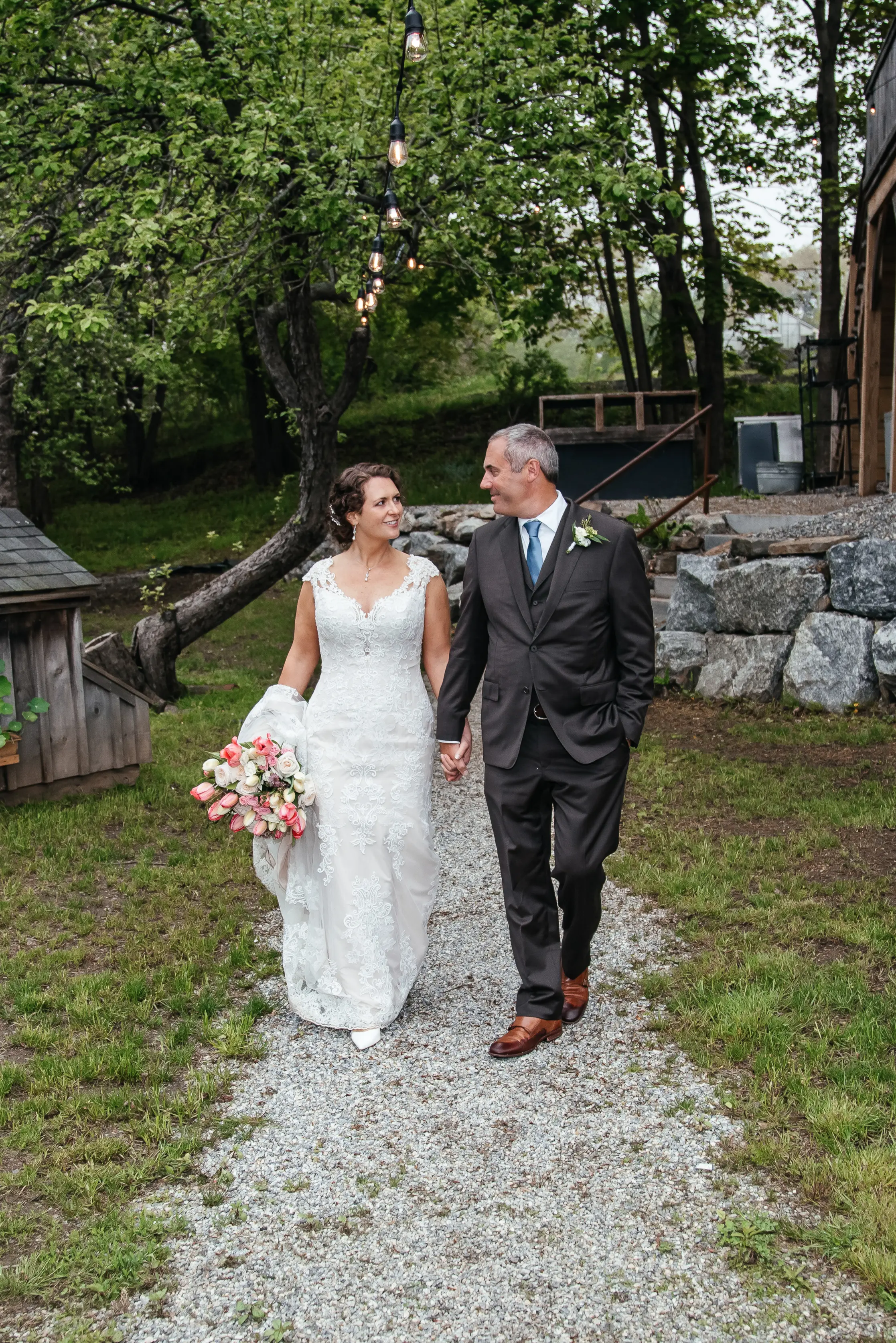 Groom With Bride Wearing Lace Fit-And-Flare Daphne By Rebecca Ingram