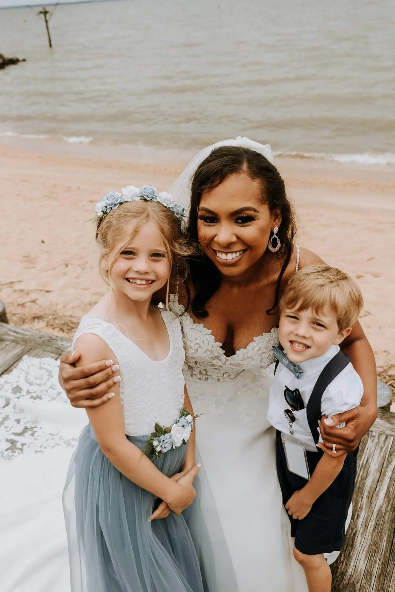 Bride Wearing Flirty A-line Wedding Gown Called Savannah By Maggie Sottero With Flower Girl and Ring Bearer