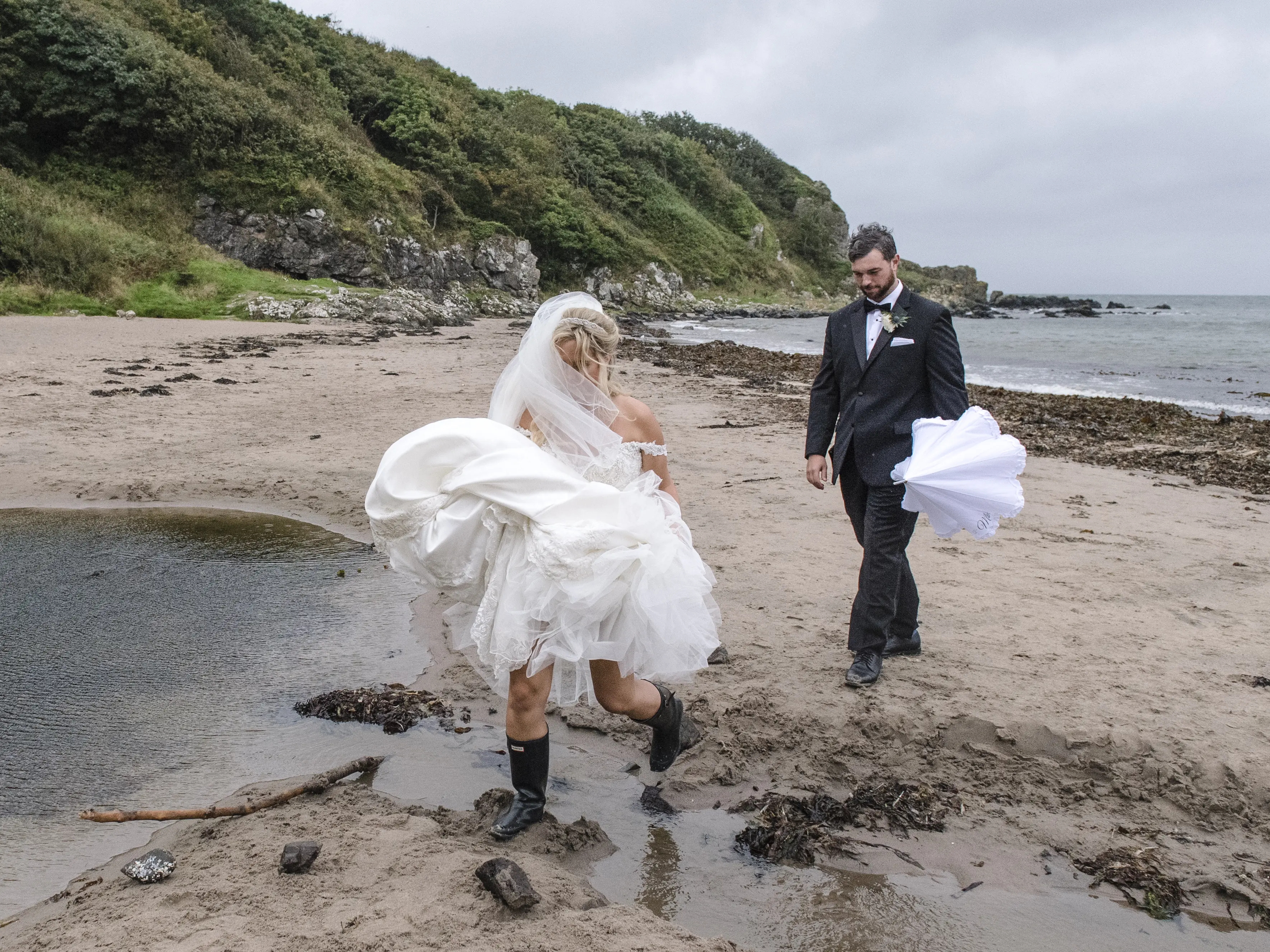 Bride In Satin Wedding Dress Called Kimora By Sottero And Midgley With Groom