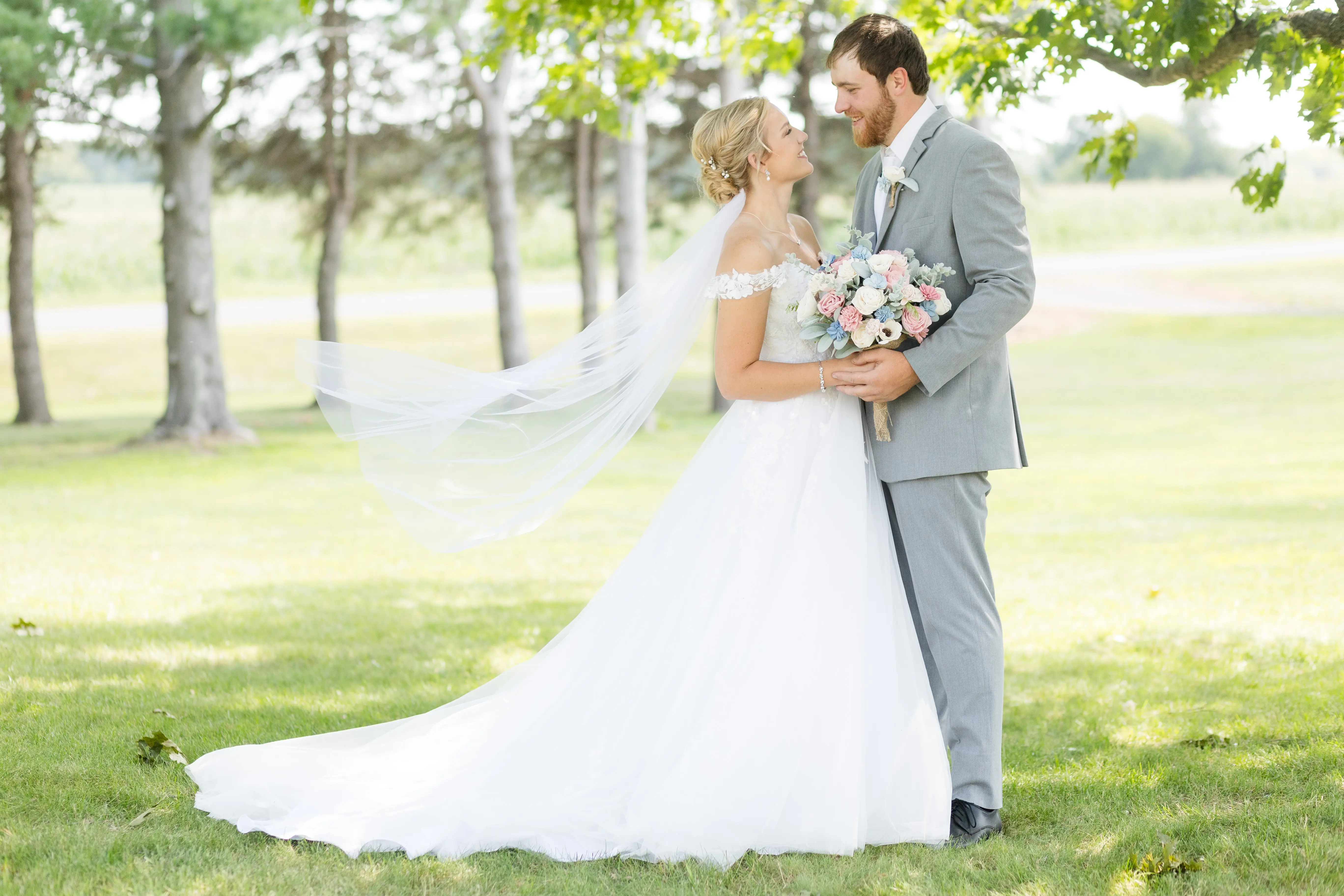 Bride Wearing Ballgown Wedding Dress Called Harlem By Maggie Sottero Looking At Groom