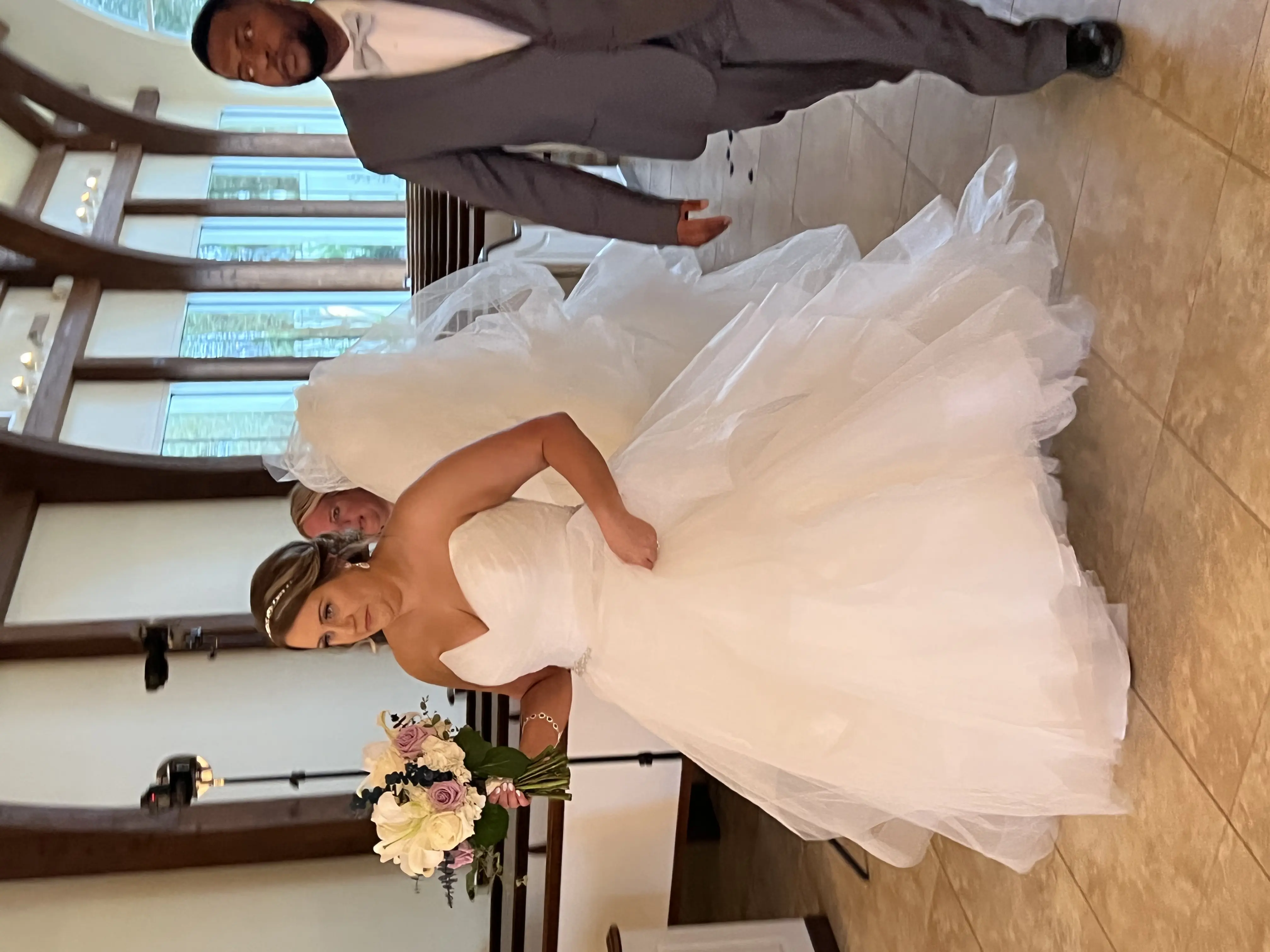 Real Bride in Strapless Tiered Wedding Dress Named Yasmin by Maggie Sottero with Groom