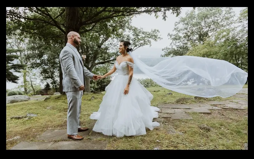 Groom With Bride Wearing Sparkle Tulle Ballgown Yasmin By Maggie Sottero