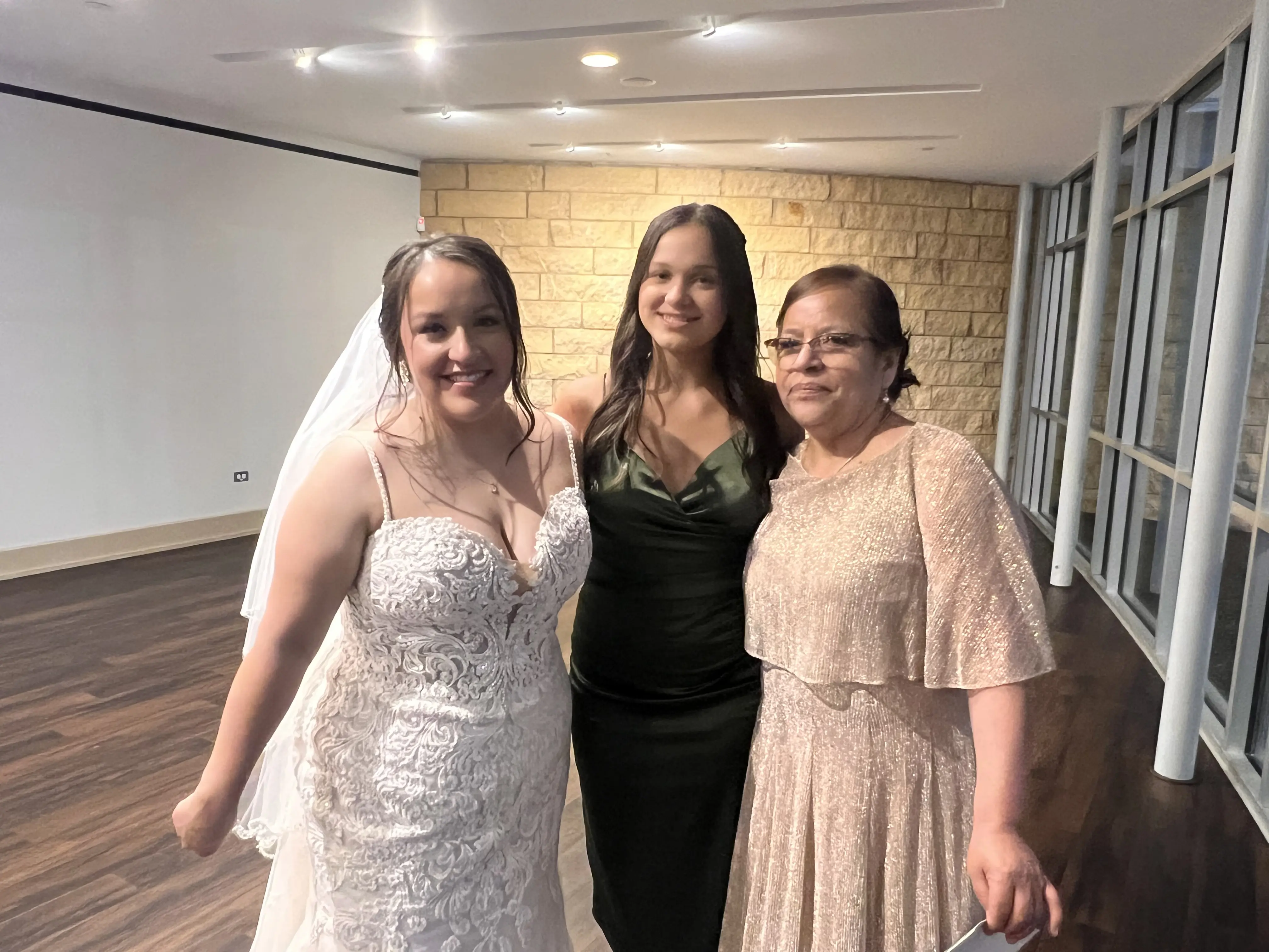 Bride wearing Fiona wedding dress by Maggie Sottero with her friends