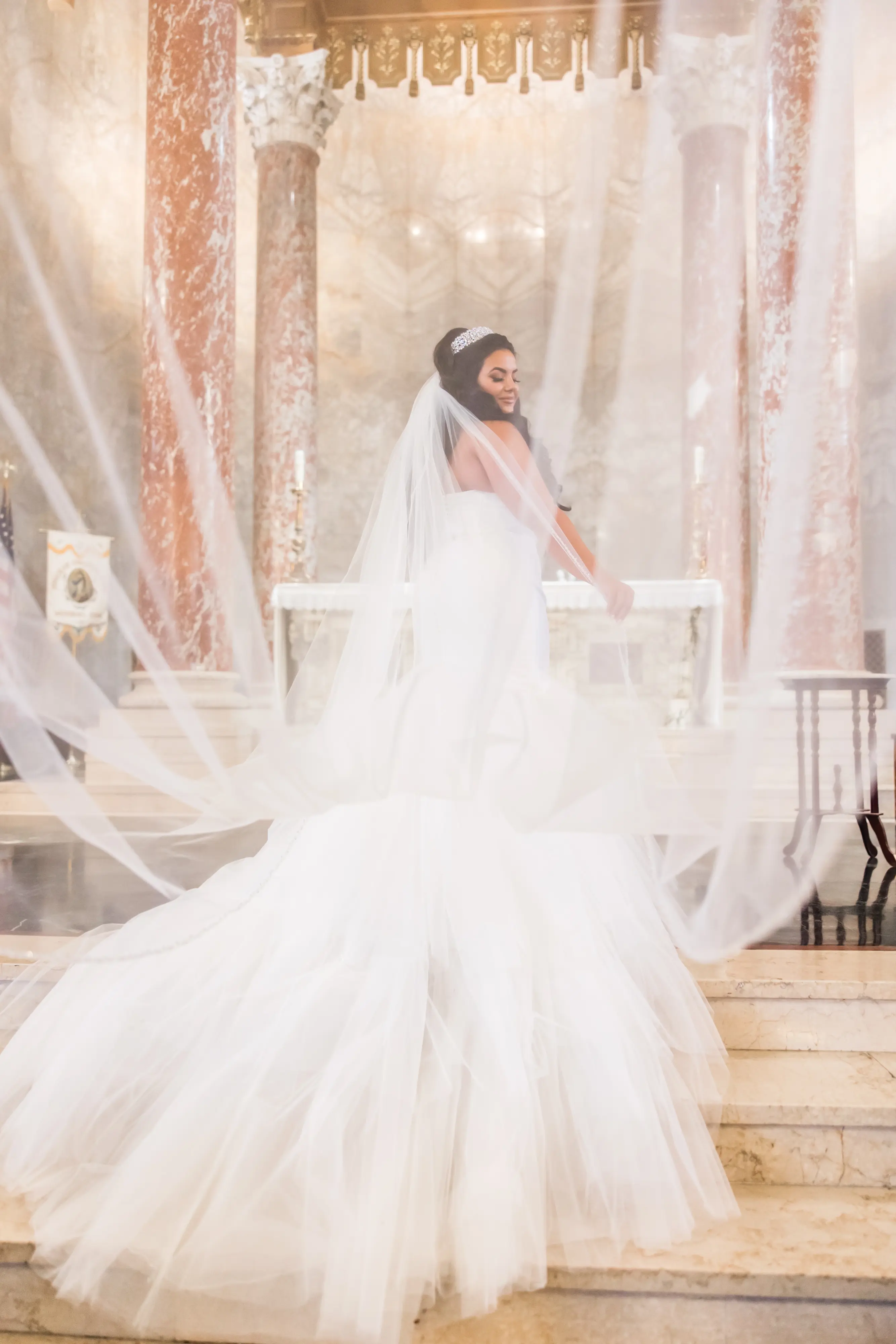 Bride Wearing Simple Mermaid Wedding Dress Called Holden By Sottero And Midgley Twirling Veil