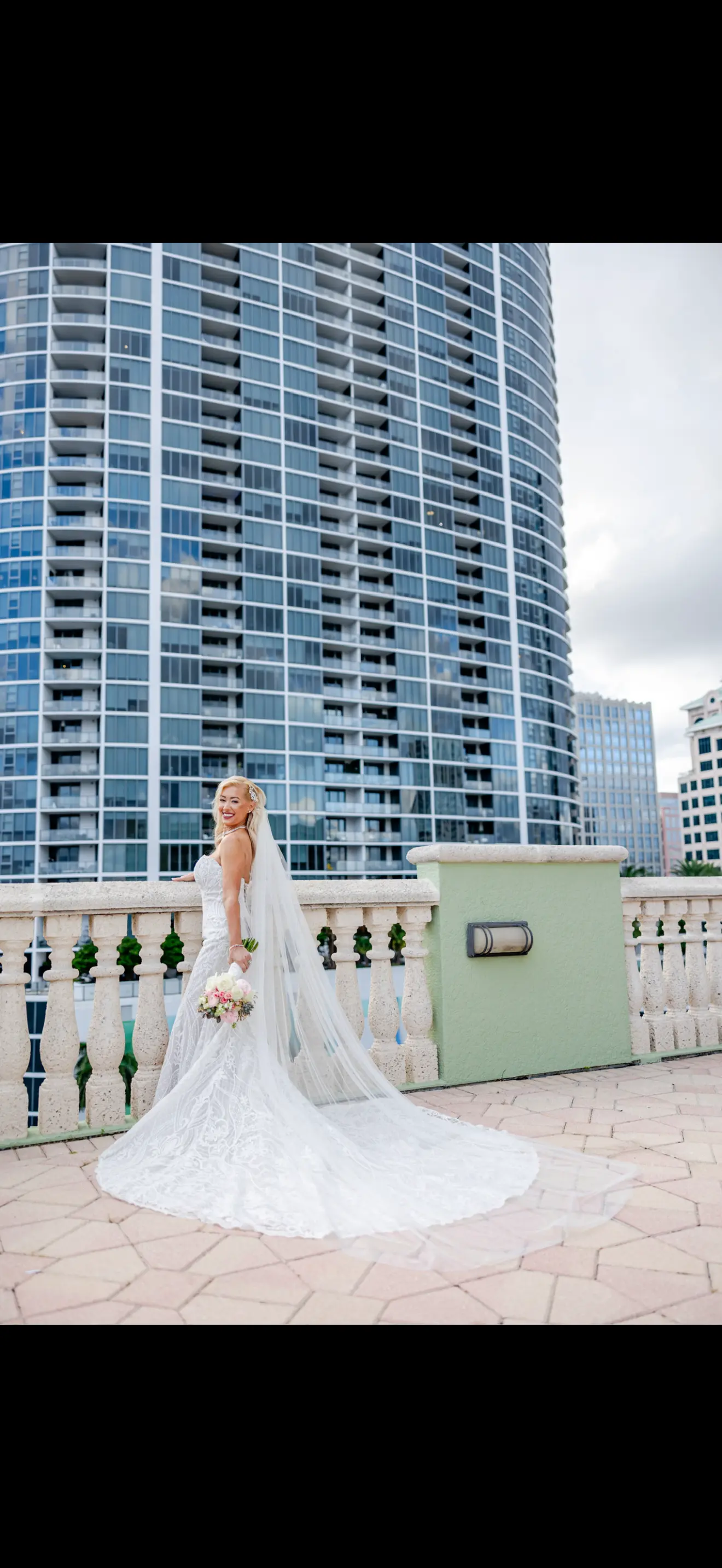 Bride Wearing Lace Mermaid Wedding Dress Called Bronson By Sottero And Midgley With A Tulle Veil