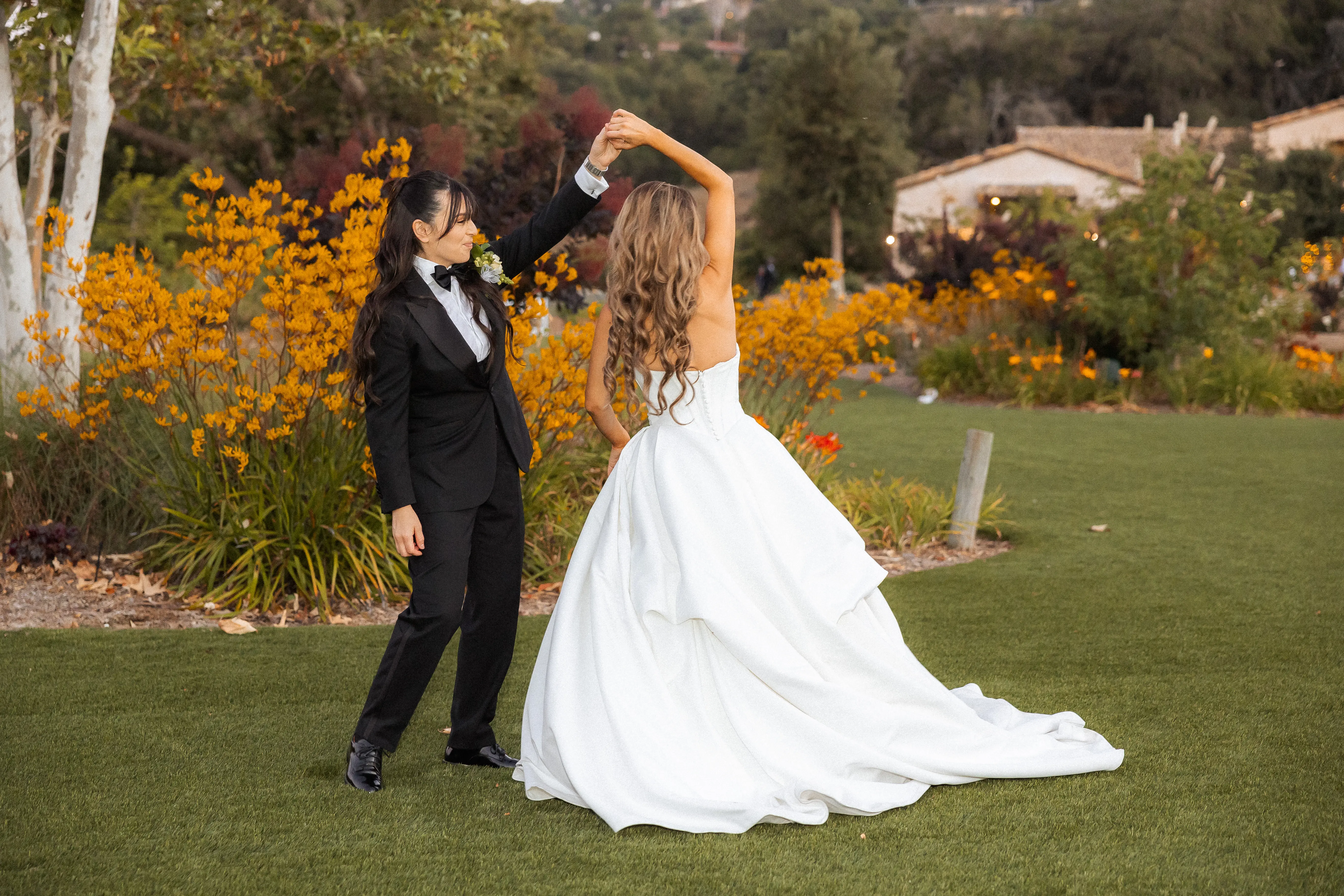 Bride wearing Derrick by Maggie Sottero dancing with her partner