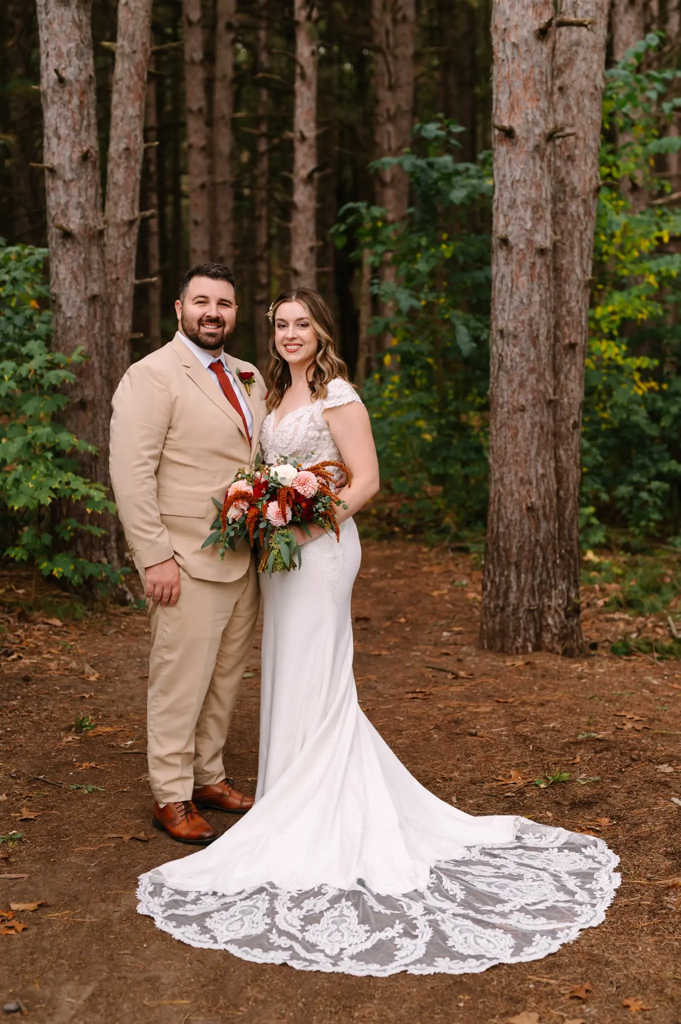 Bride Wearing Crepe Lace Wedding Dress Called Anson By Sottero And Midgley With Groom In The Woods
