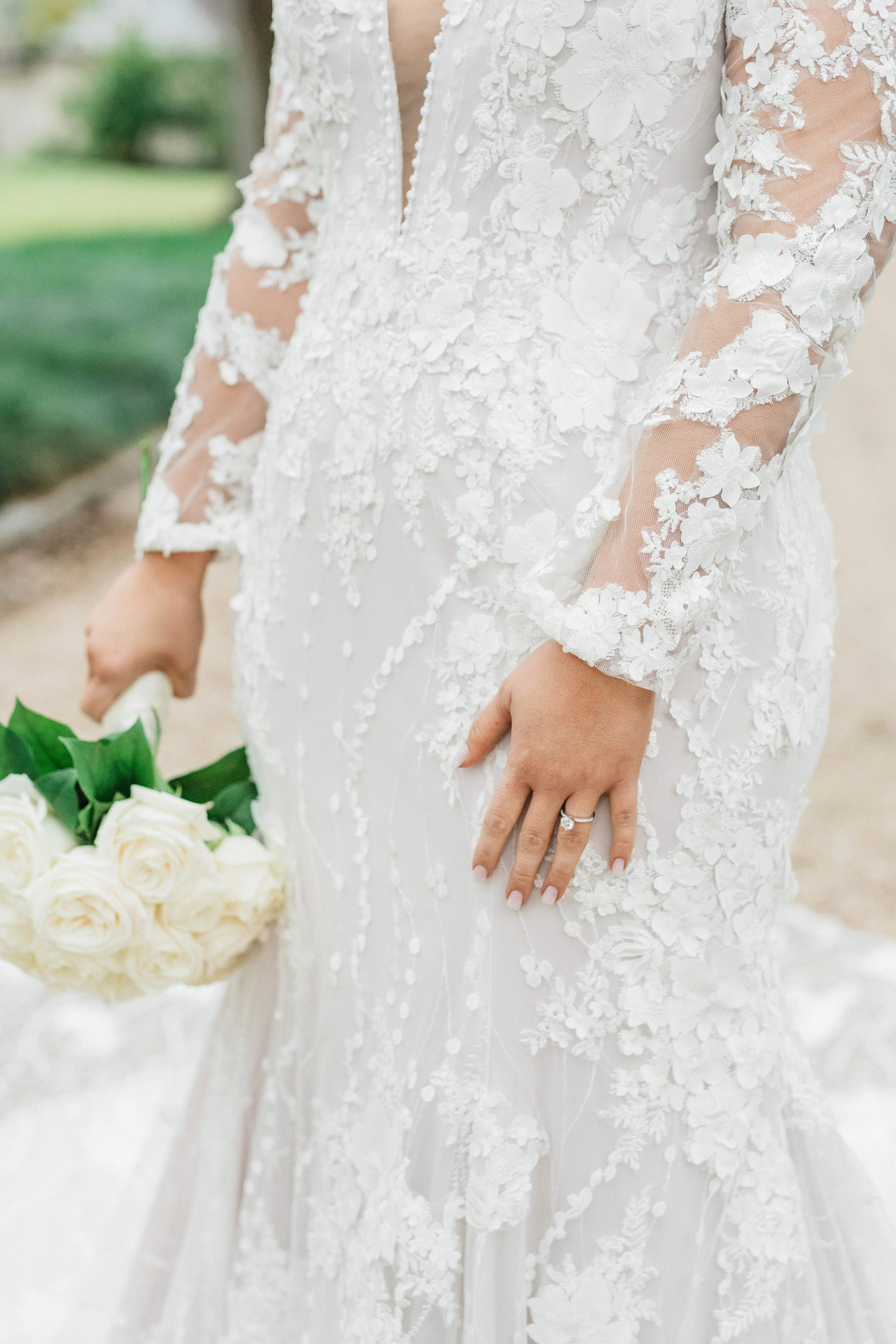 Bride In Sexy Lace Wedding Dress With Plunging Neckline Called Cruz By Sottero and Midgley With Simple Engagement Ring