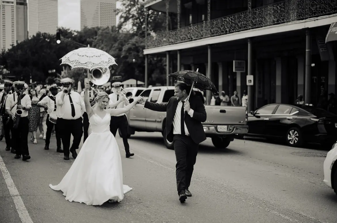 Bride Wearing Modern Princess Wedding Dress Called Aubrielle By Maggie Sottero With A Band Playing Behind Her