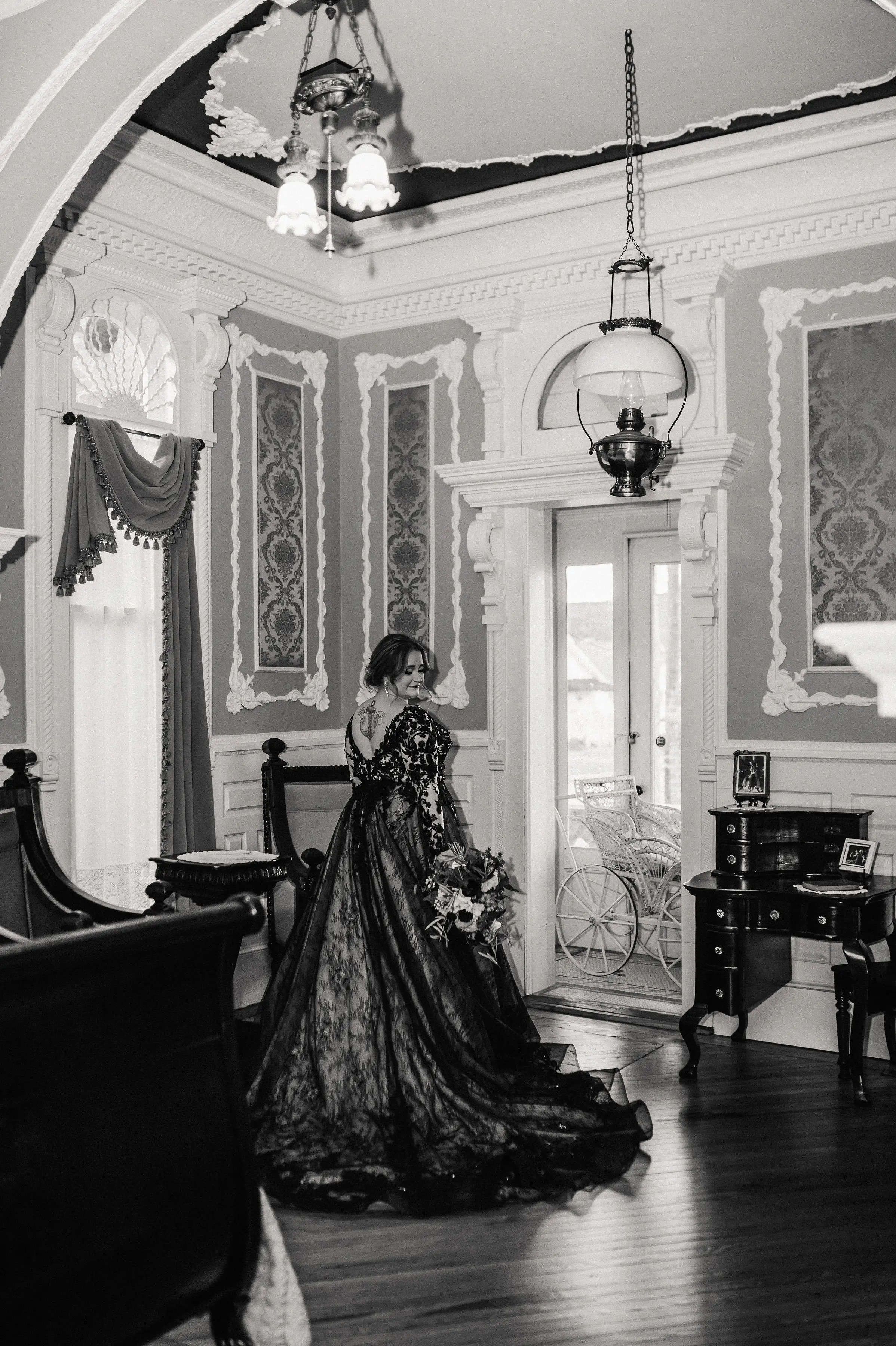 Bride In Long Sleeve Black Wedding Dress Called Zander By Sottero And Midgley