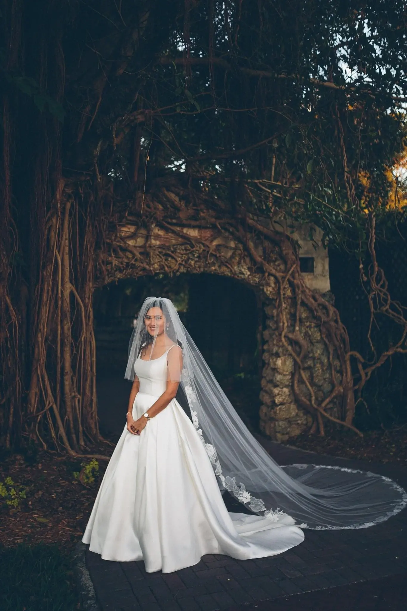 Bride With Floral Veil Wearing Flattering Ball Gown Wedding Dress Called Selena By Maggie Sottero