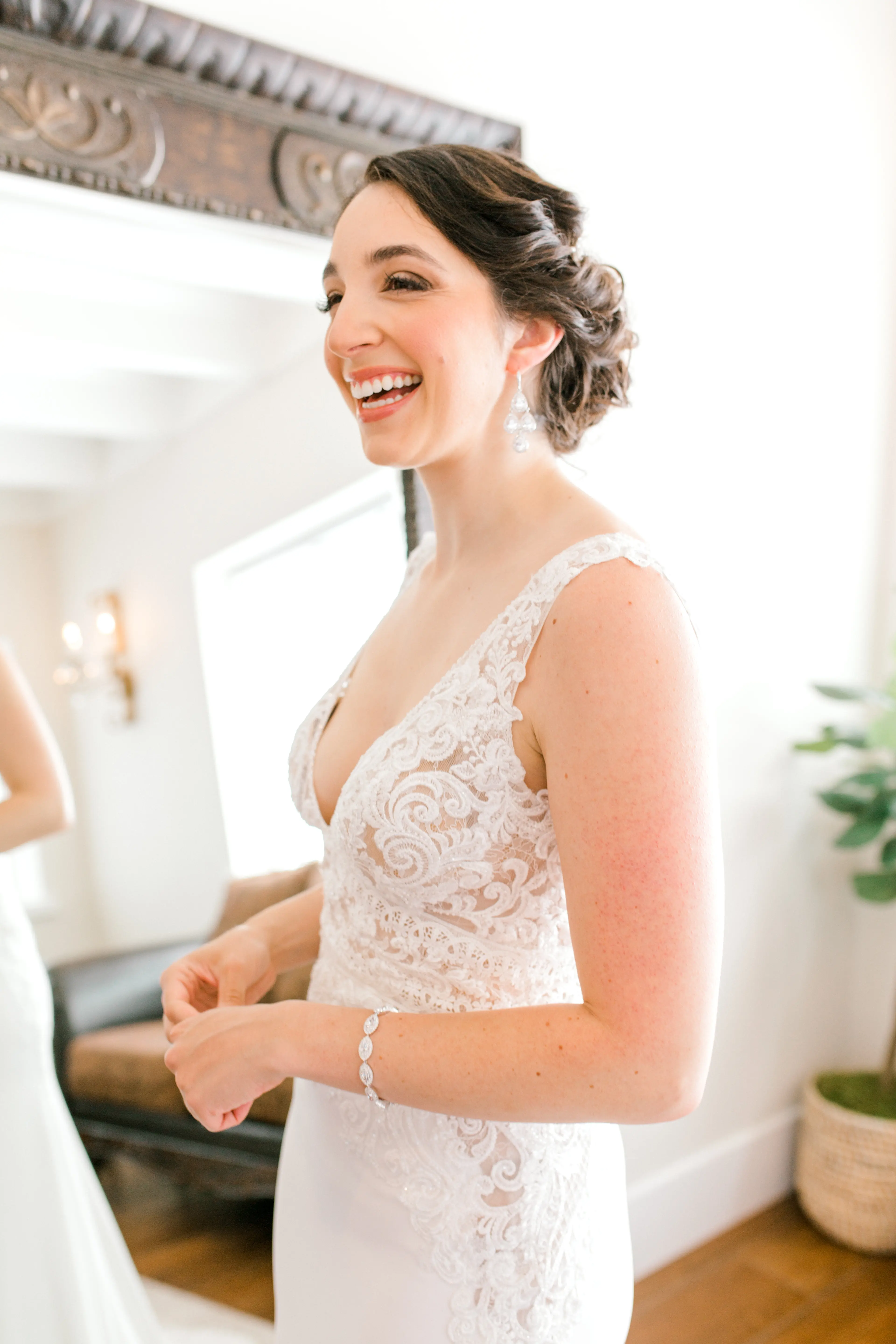 Bride smiling wearing wedding dress called Aidan.