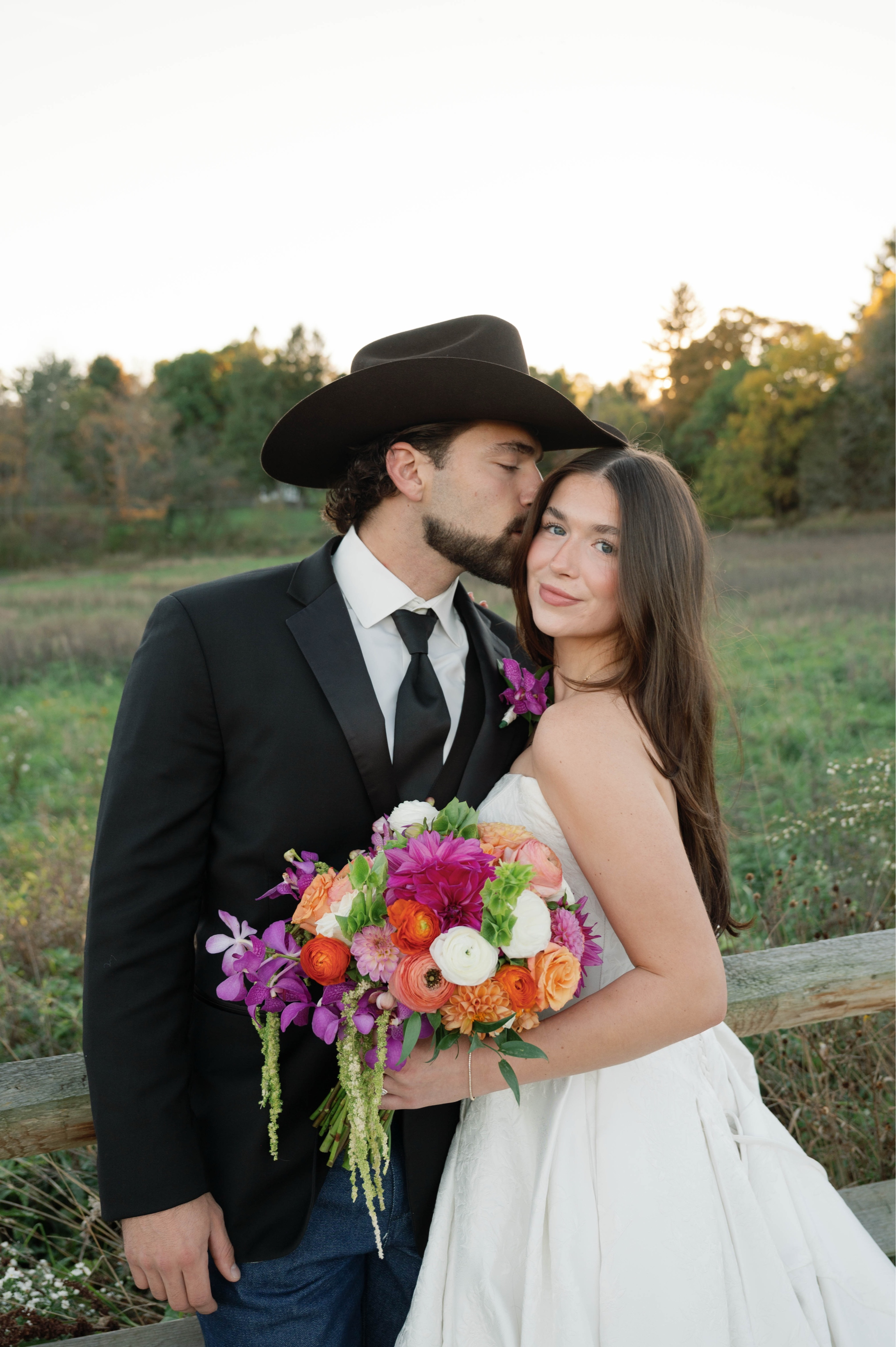 Bride Wearing Jacquard Ballgown Wedding Dress Called Fortune Marie By Maggie Sottero with groom