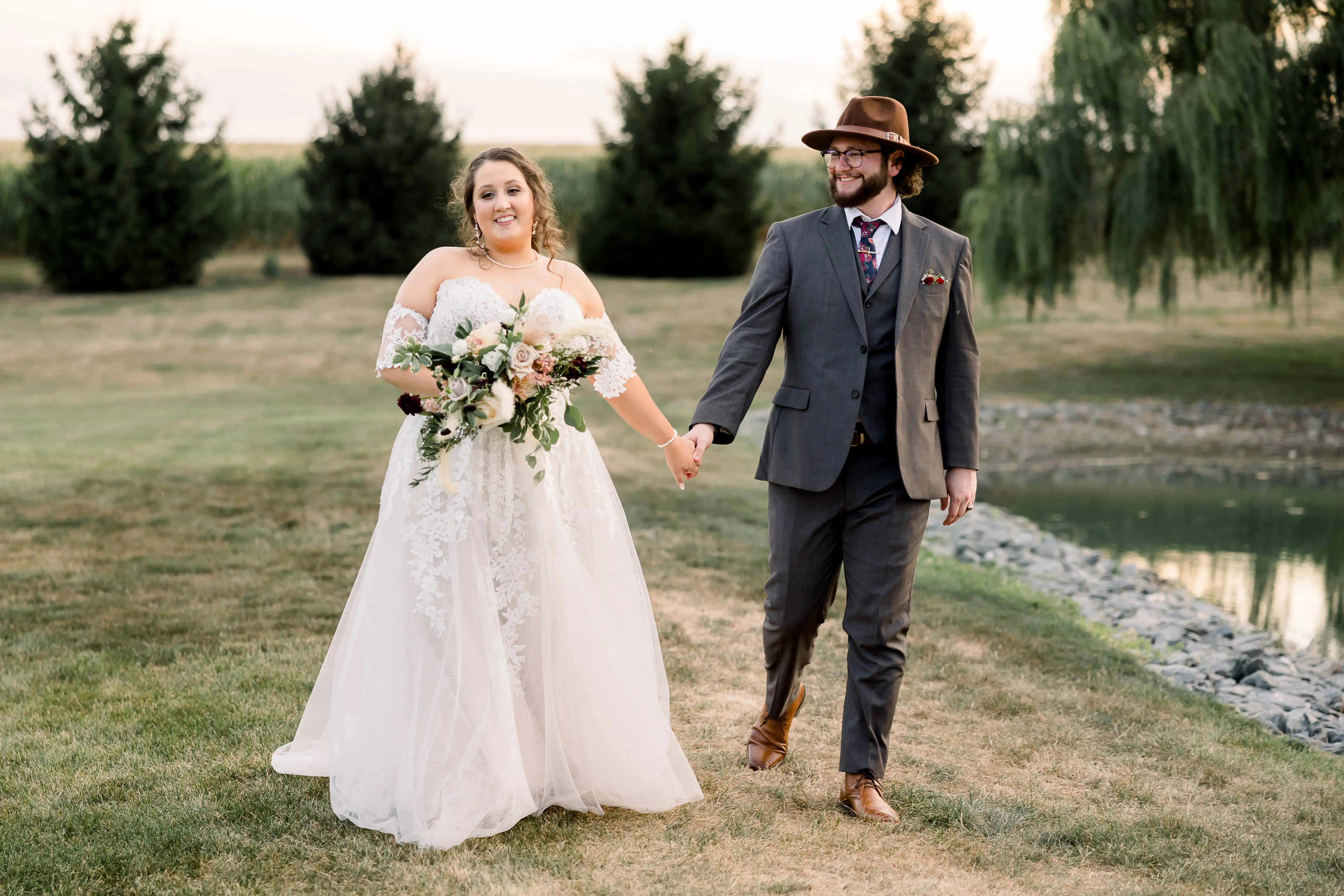 Plus Size Bride In Lace A-Line Wedding Dress Called Nora By Maggie Sottero With Groom