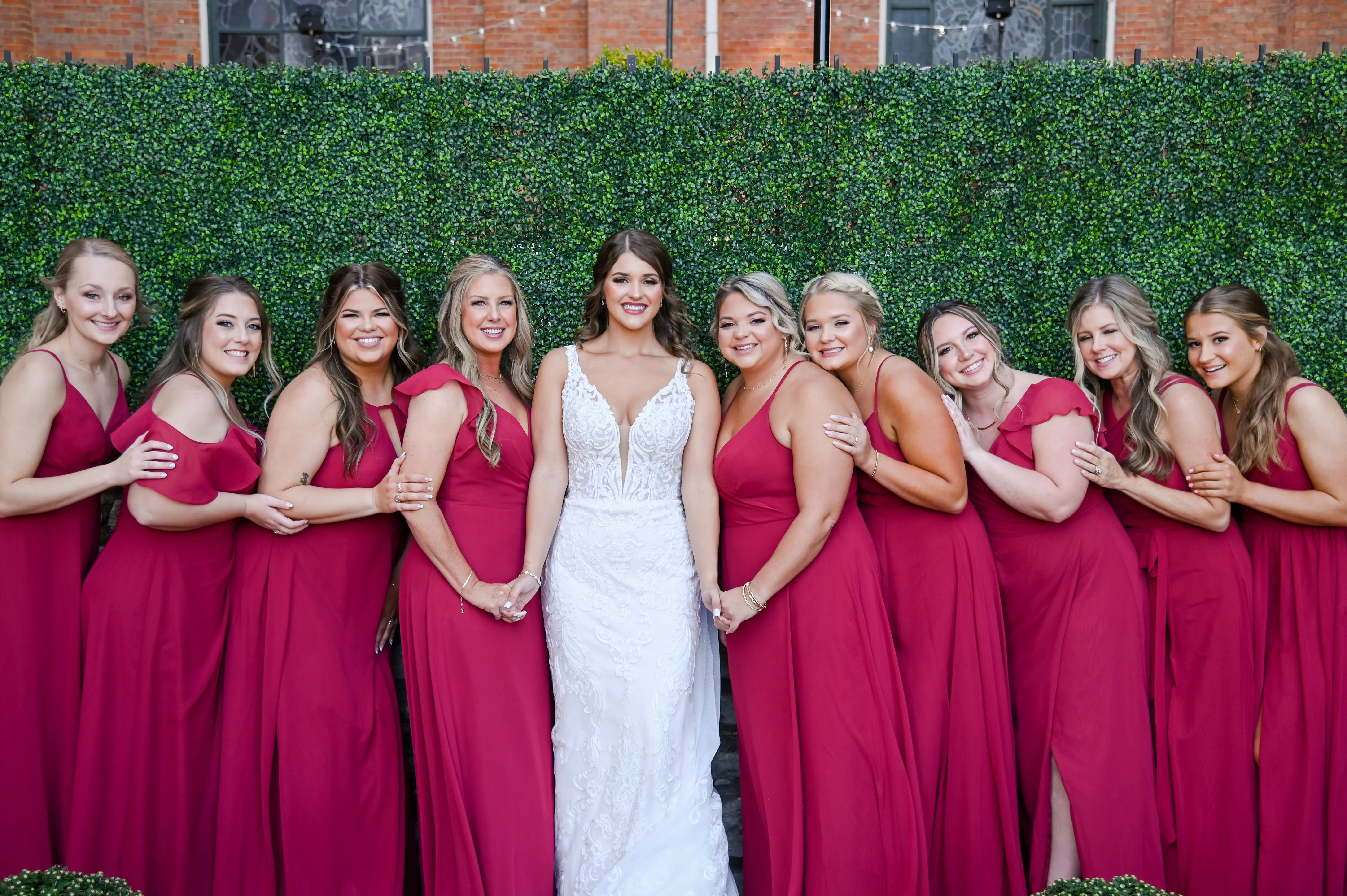 Bride wearing Hamilton wedding dress by Sottero and Midgley with her bridesmaids