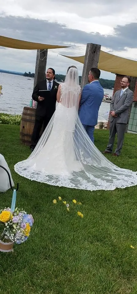 Bride and groom saying their vows at the alter.