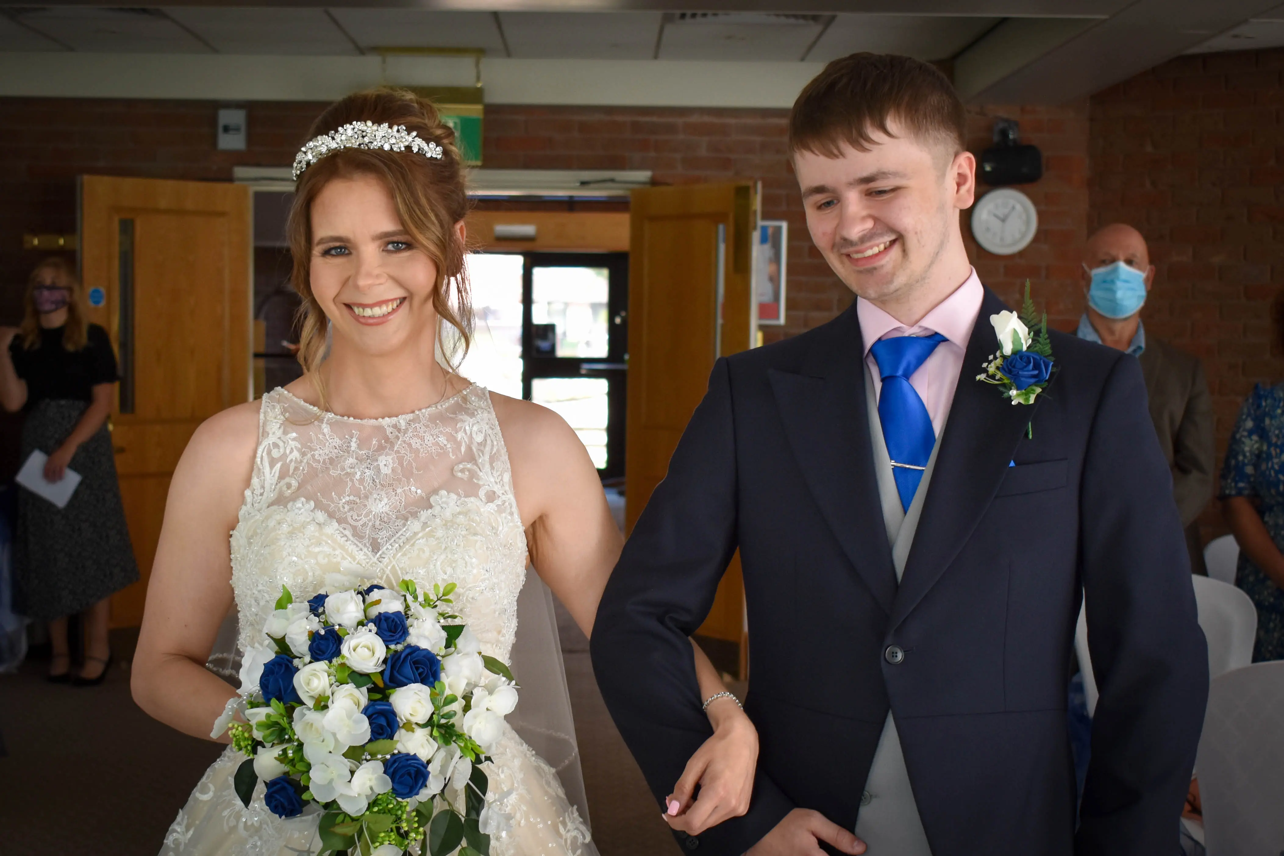 Bride wearing a lace and tulle ballgown wedding dress