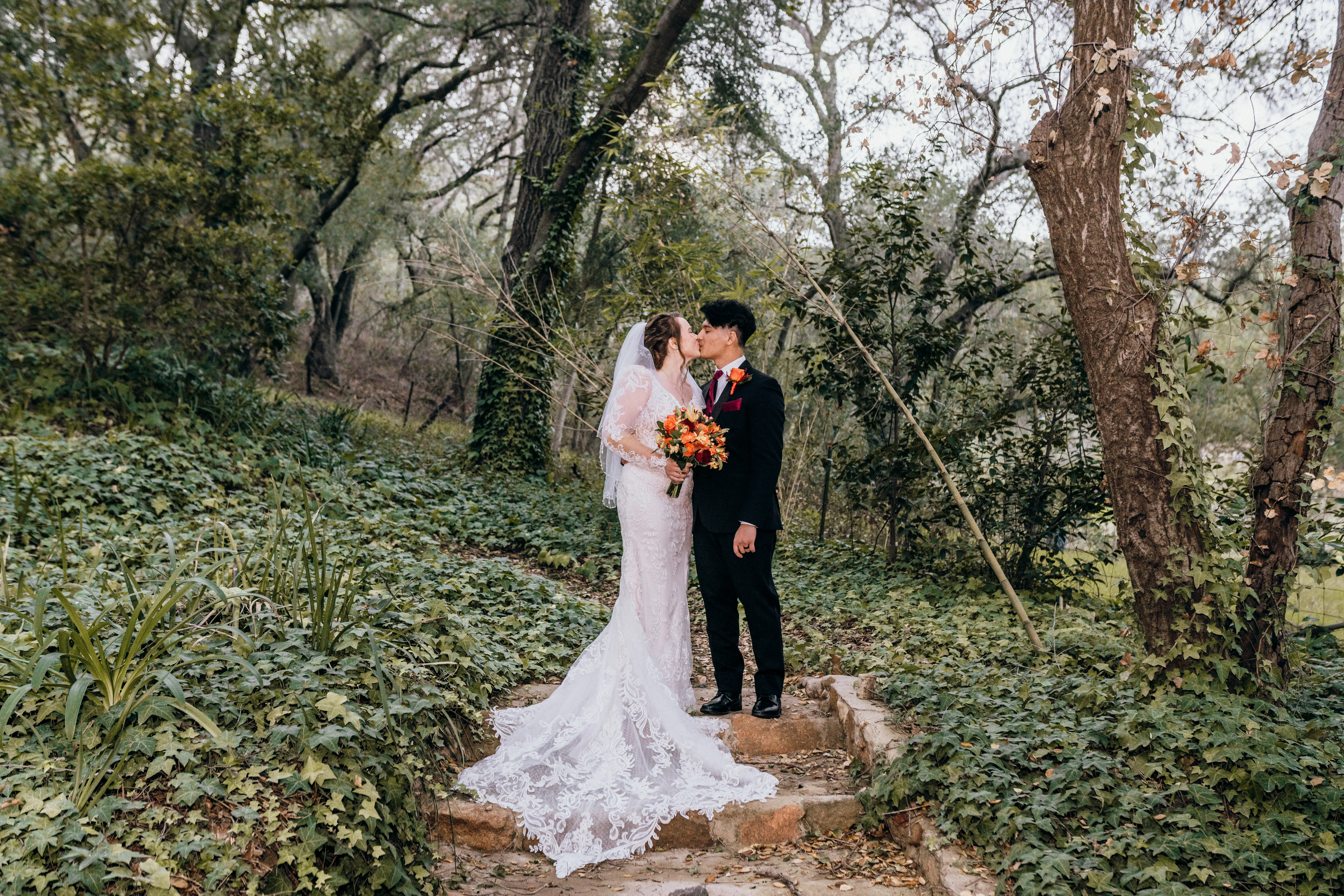 Bride In Embroidered Lace Sheath Dress Hamilton Sottero Midgley With Groom