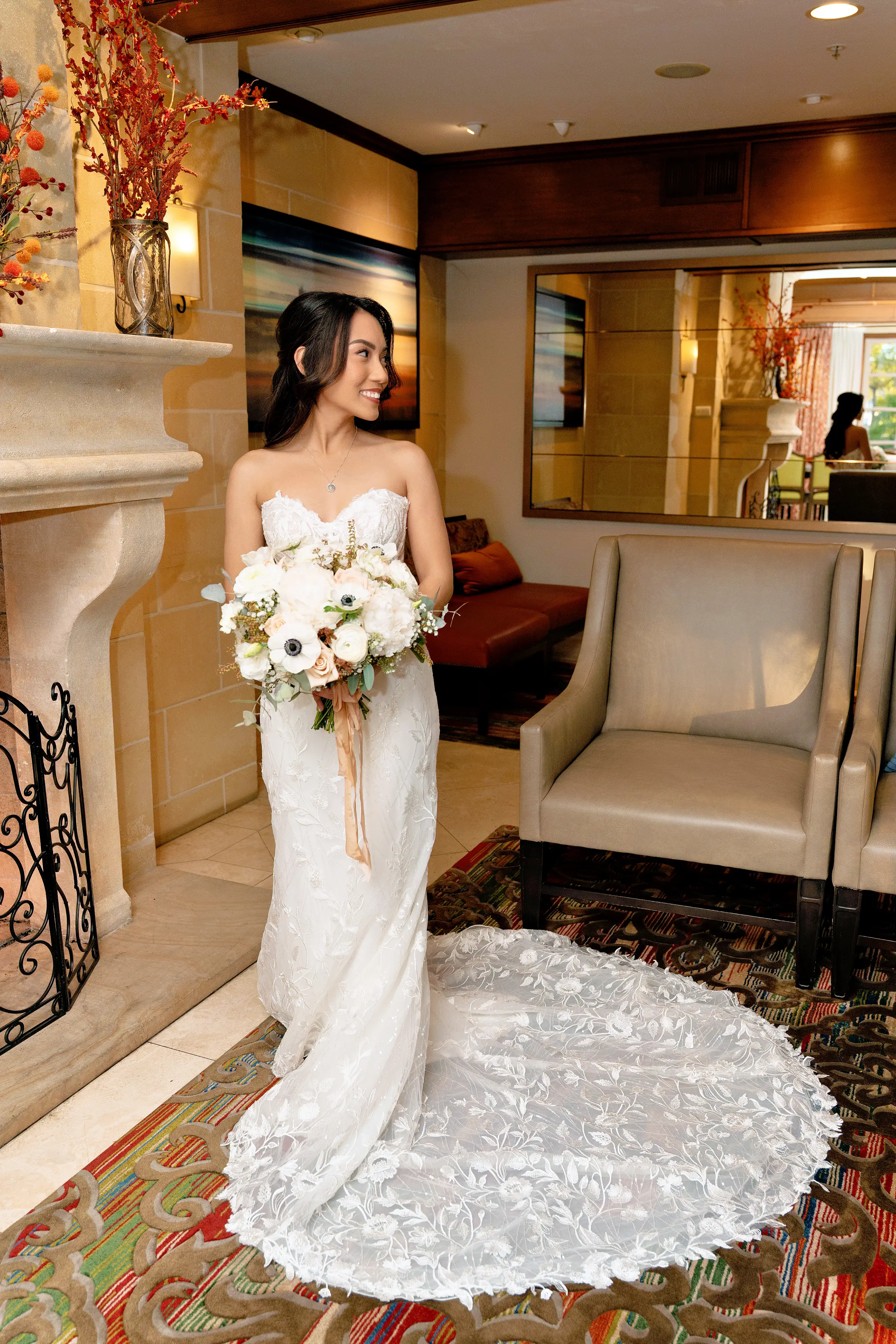 Bride Wearing Lace Fit And Flare Wedding Dress Called Fairchild By Maggie Sottero In A Hotel Room