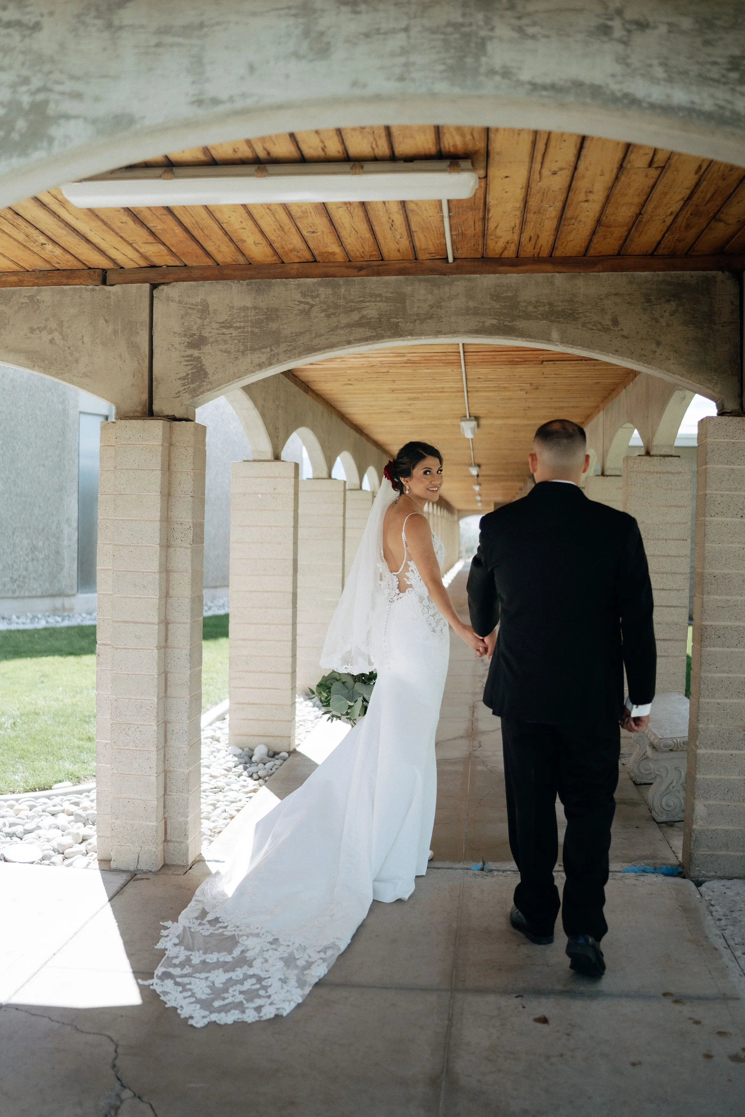 Groom with Bride in Lace Spaghetti Strap Mermaid Wedding Gown Called Nikki by Maggie Sottero