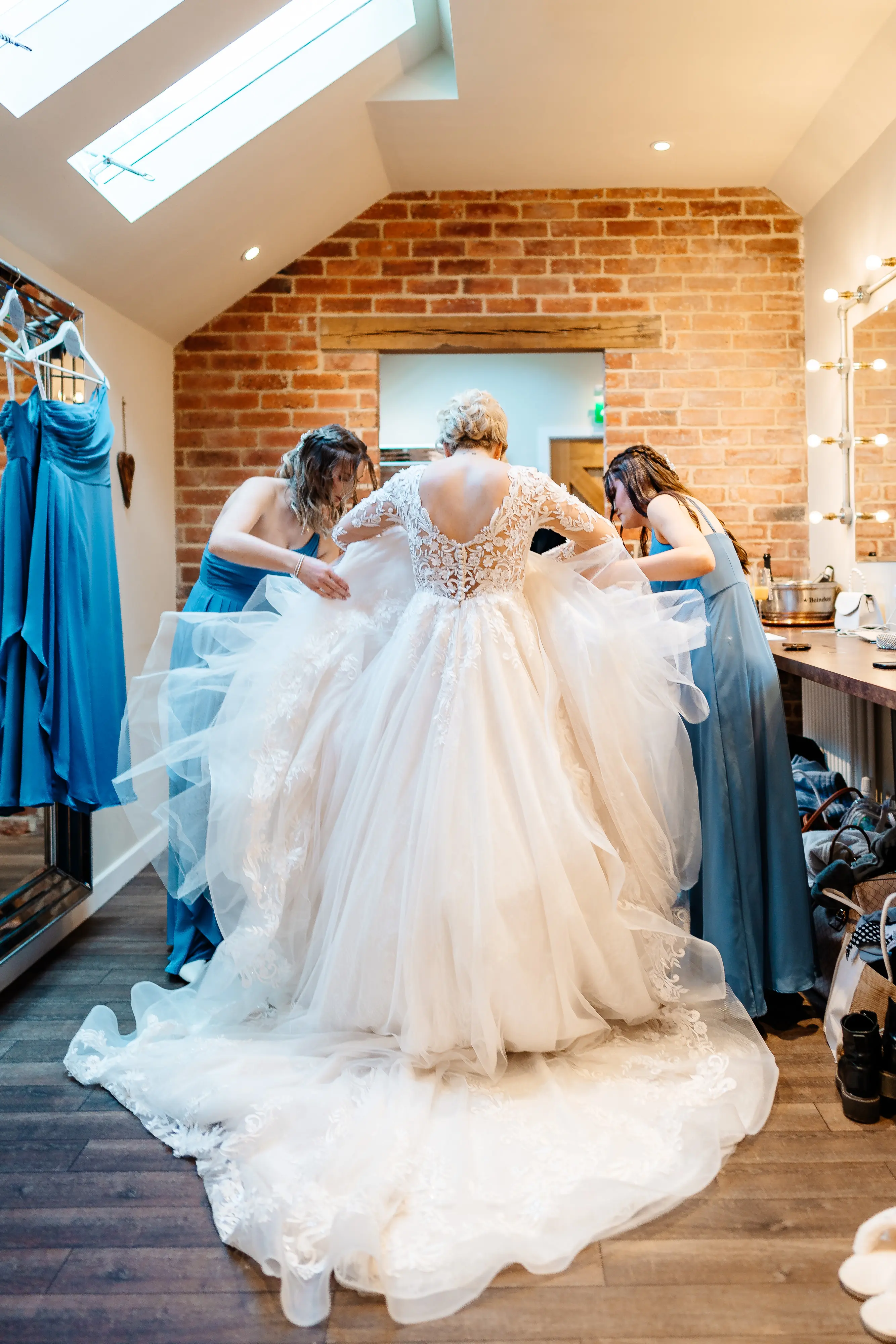 Brides In Illusion Sleeves V-Neckline Zander Sottero Midgley With Bridesmaids in Blue
