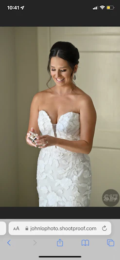 Bride Wearing Strapless Mermaid Wedding Dress With Oversized Lace Hattie By Rebecca Ingram