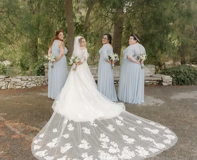 bride wearing off the shoulder A line wedding dress