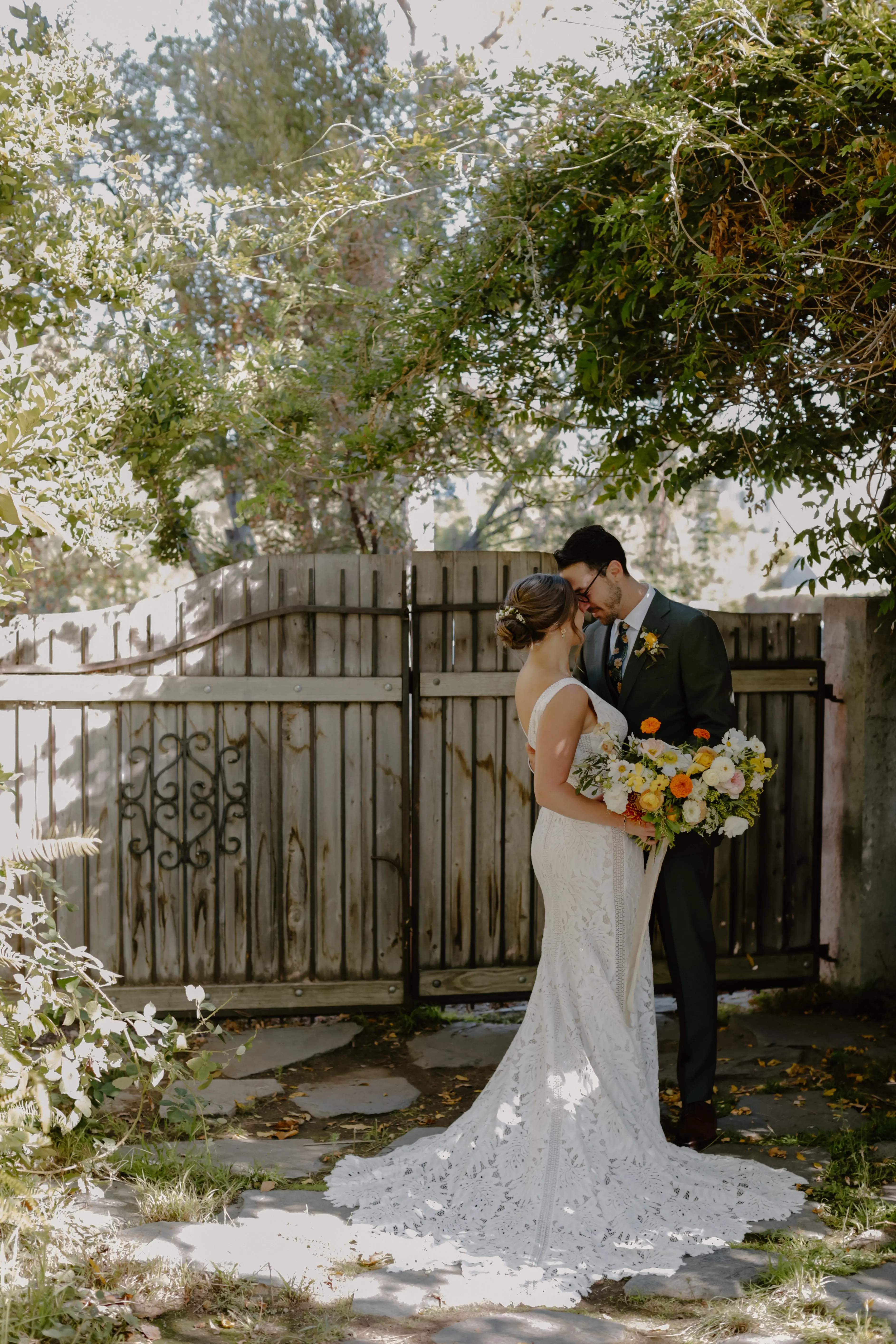 Bride wearing sexy boho lace wedding dress.