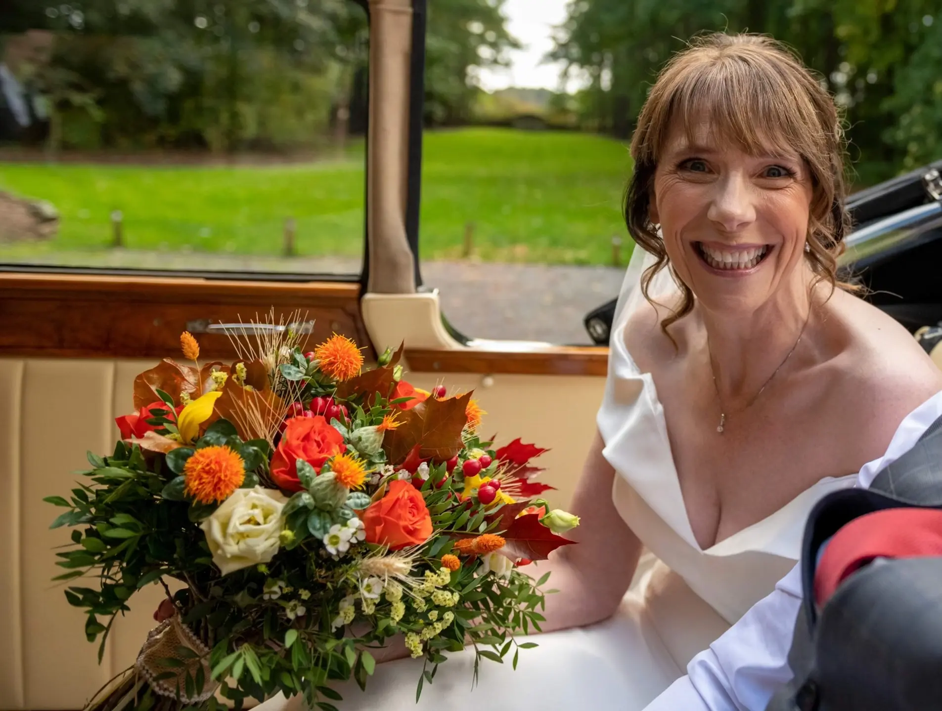 Real Bride in Off-the-Shoulder Fit-and-Flare Wedding Dress in Huron Mikado Called Josie by Rebecca Ingram