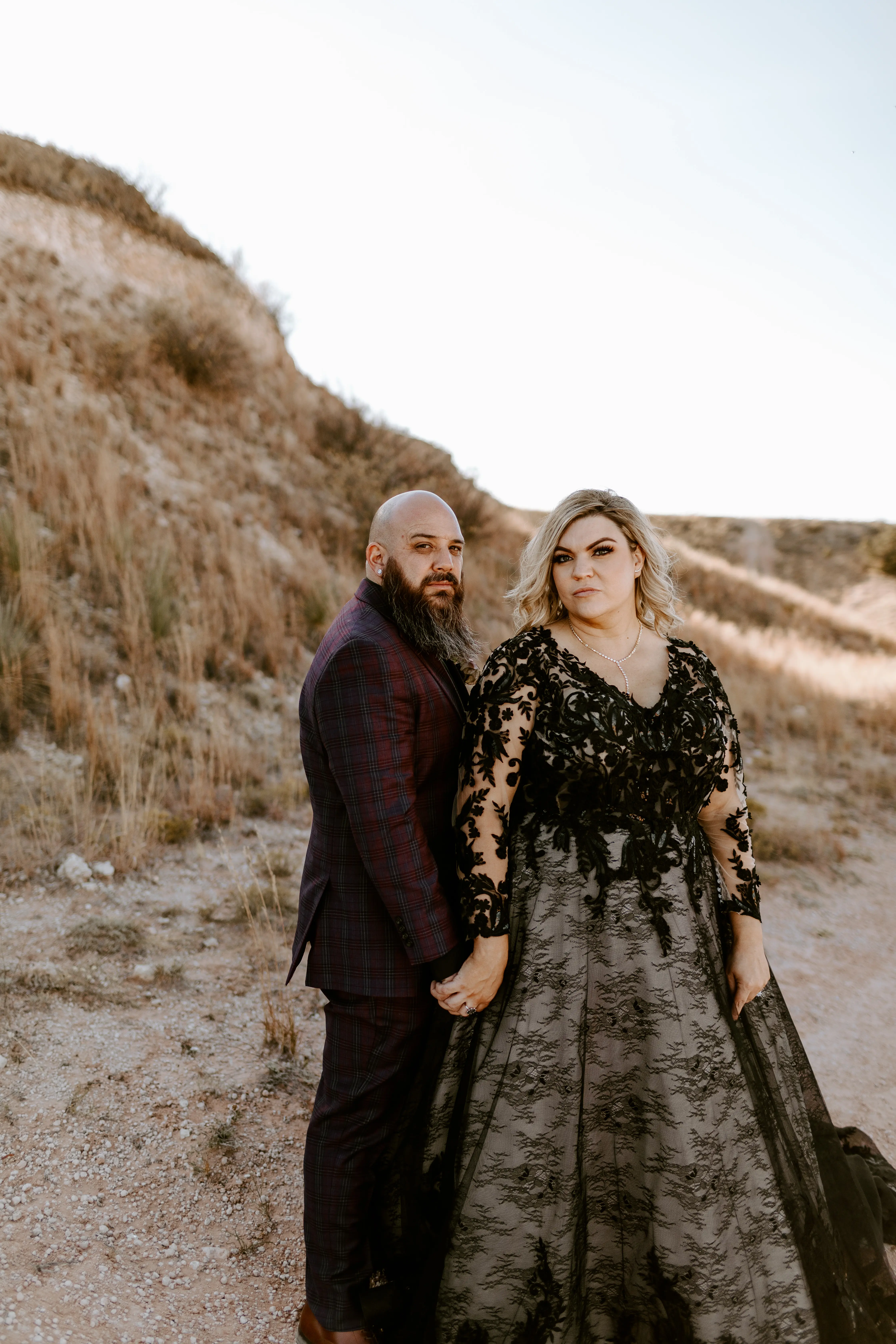 Bride Wearing Black Lace Wedding Dress Called Zander By Sottero And Midgley With Groom On The Beach