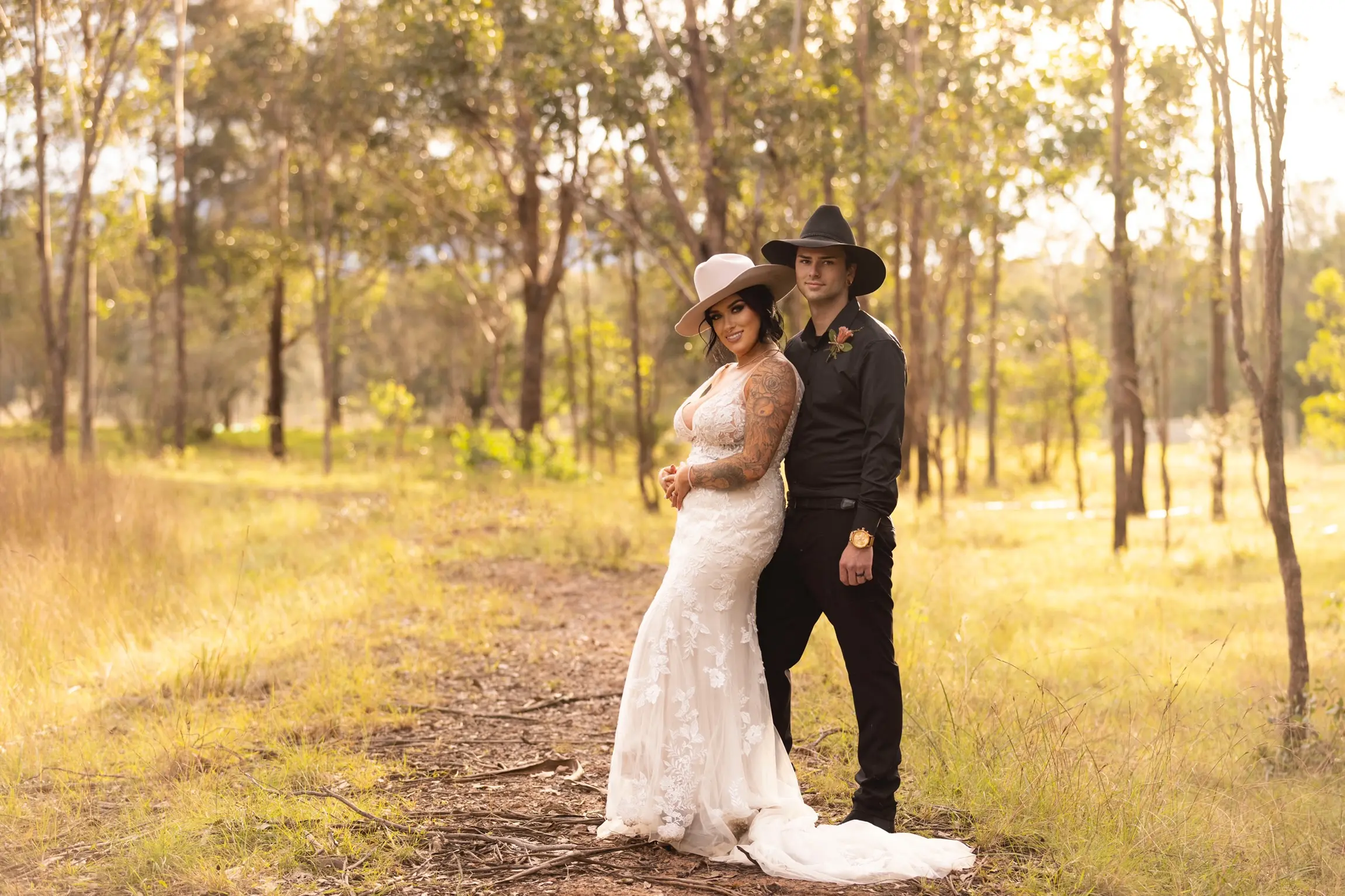 Bride In Cowboy Hat And Gown Called Greenley Lane By Maggie Sottero