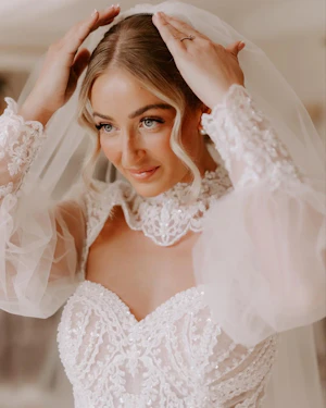 Bride wearing Yates wedding dress by Maggie Sottero