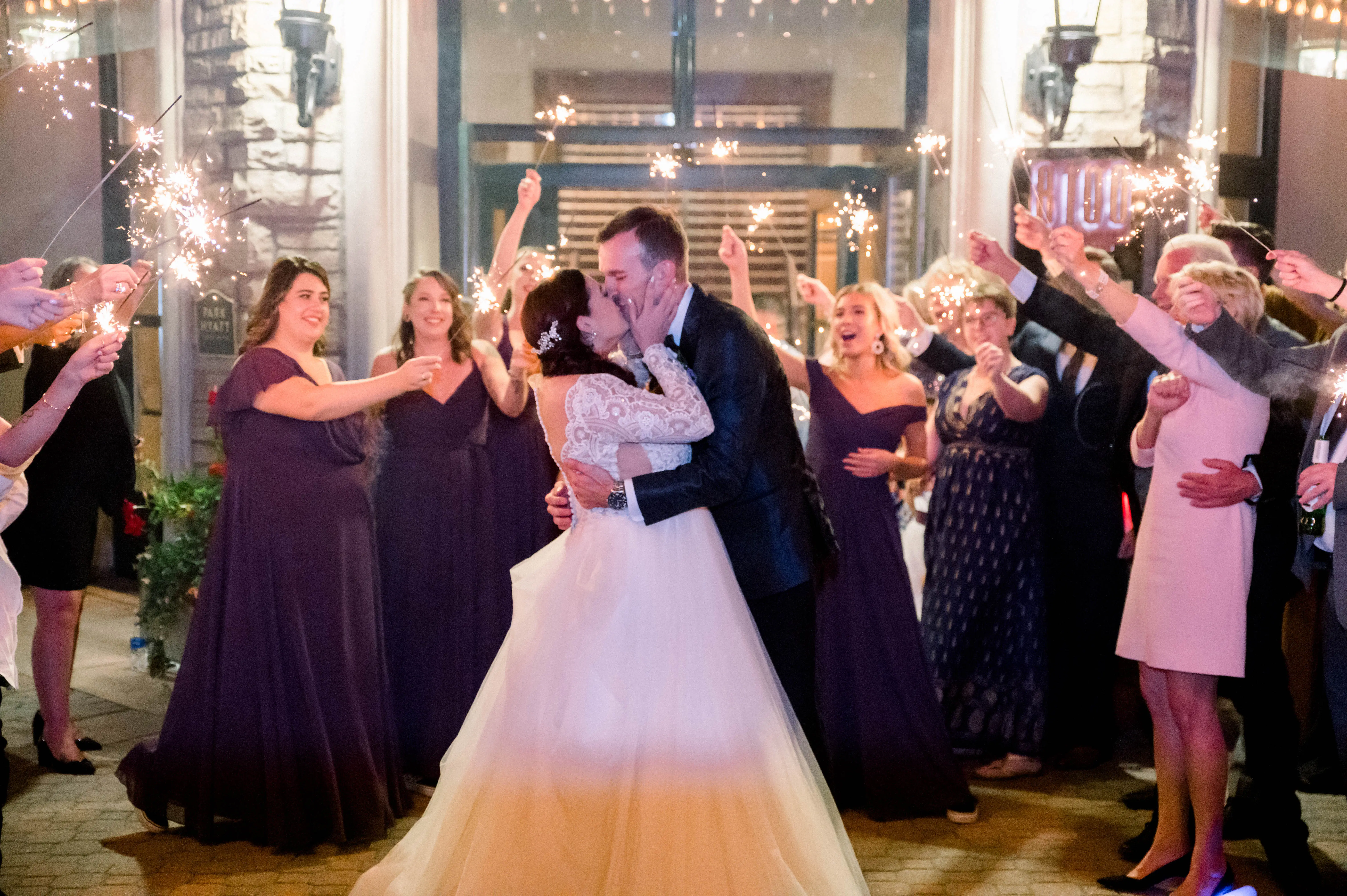 Bride Wearing Princess Wedding Dress Called Mallory Dawn By Maggie Sottero Kissing the Groom