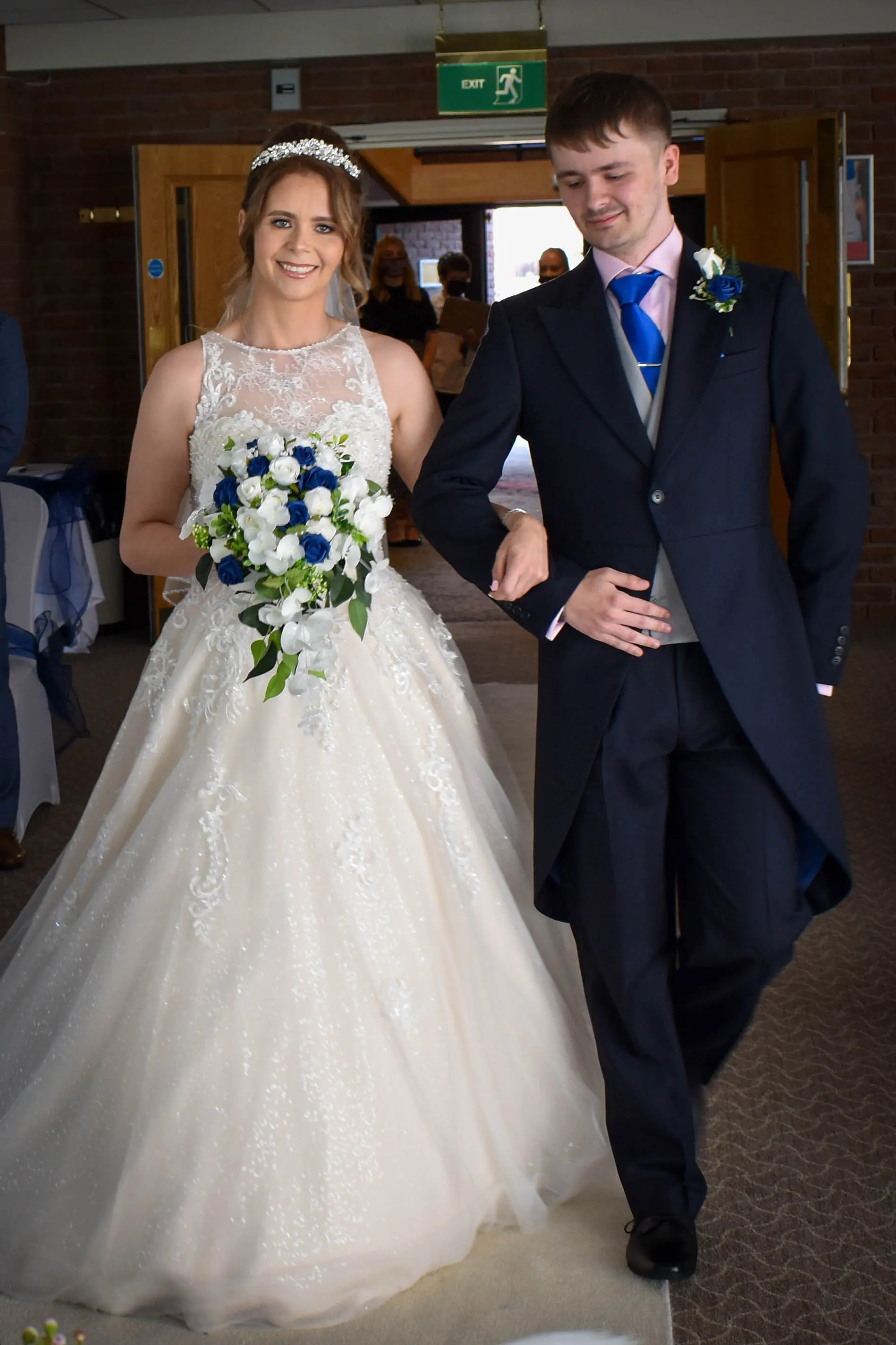 Bride wearing a lace and tulle ballgown wedding dress