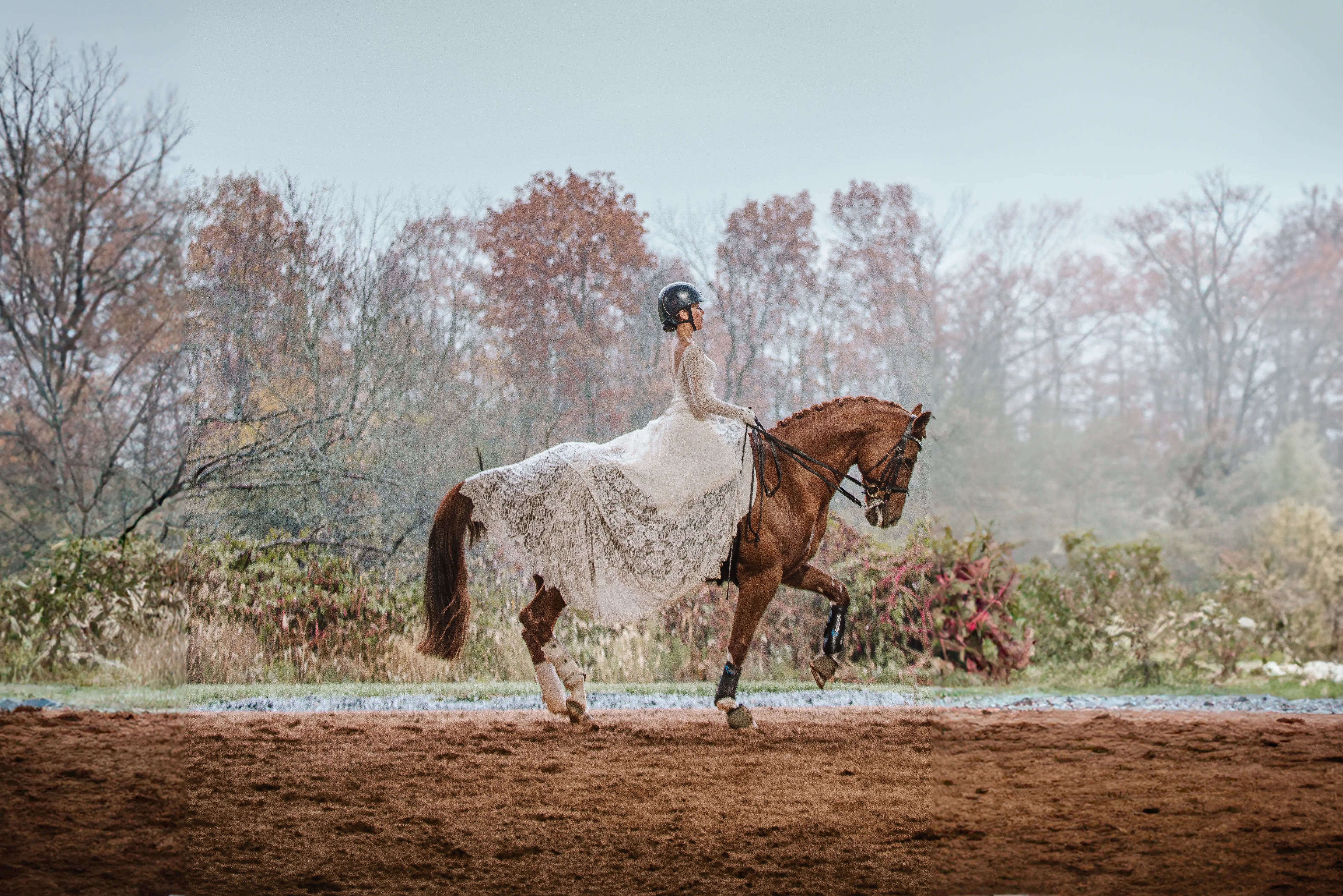Bride wearing Drita wedding dress by Maggie Sottero riding a horse