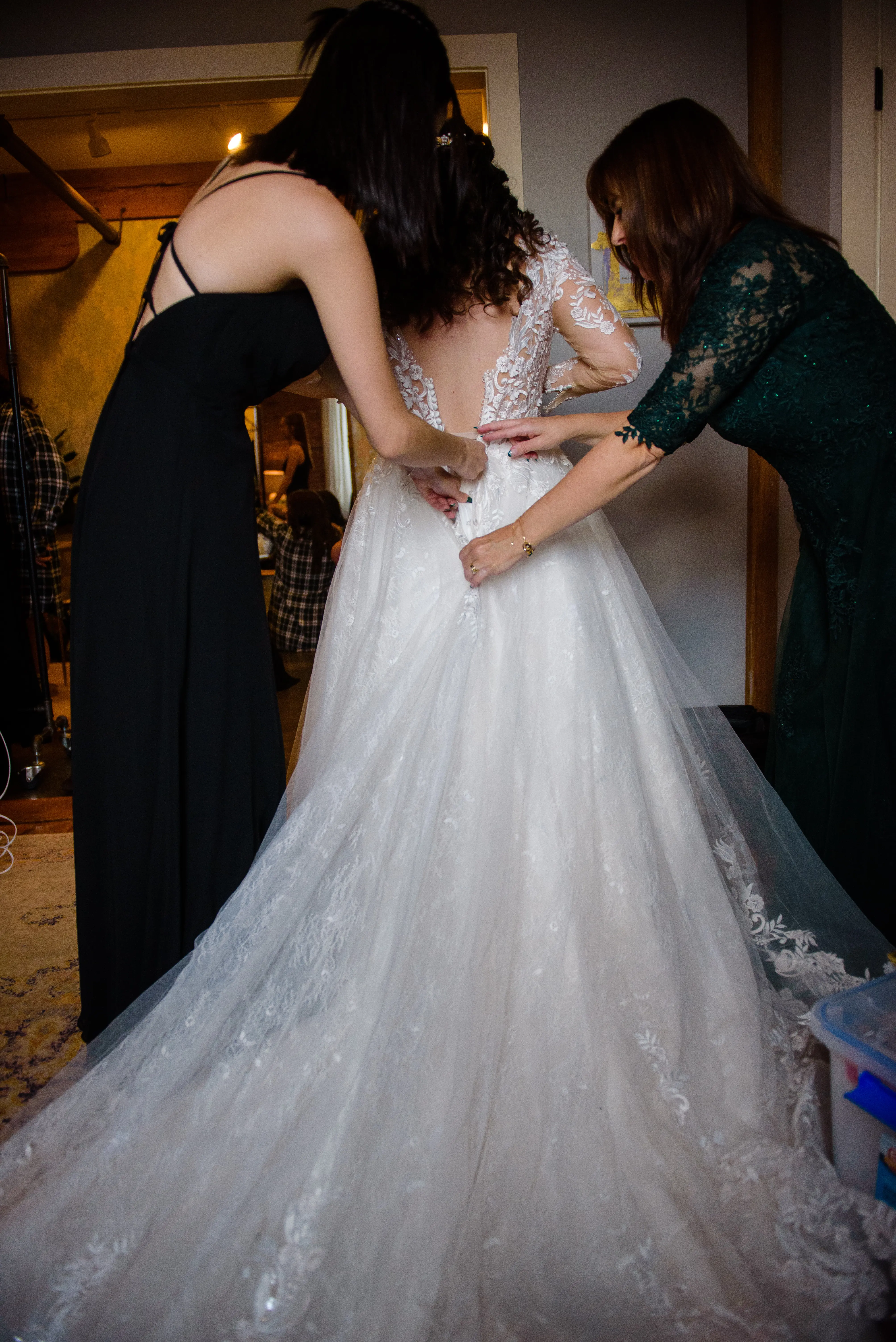 Bride Getting Ready Wearing Lace Long Sleeve Wedding Dress Called Zander By Sottero And Midgley