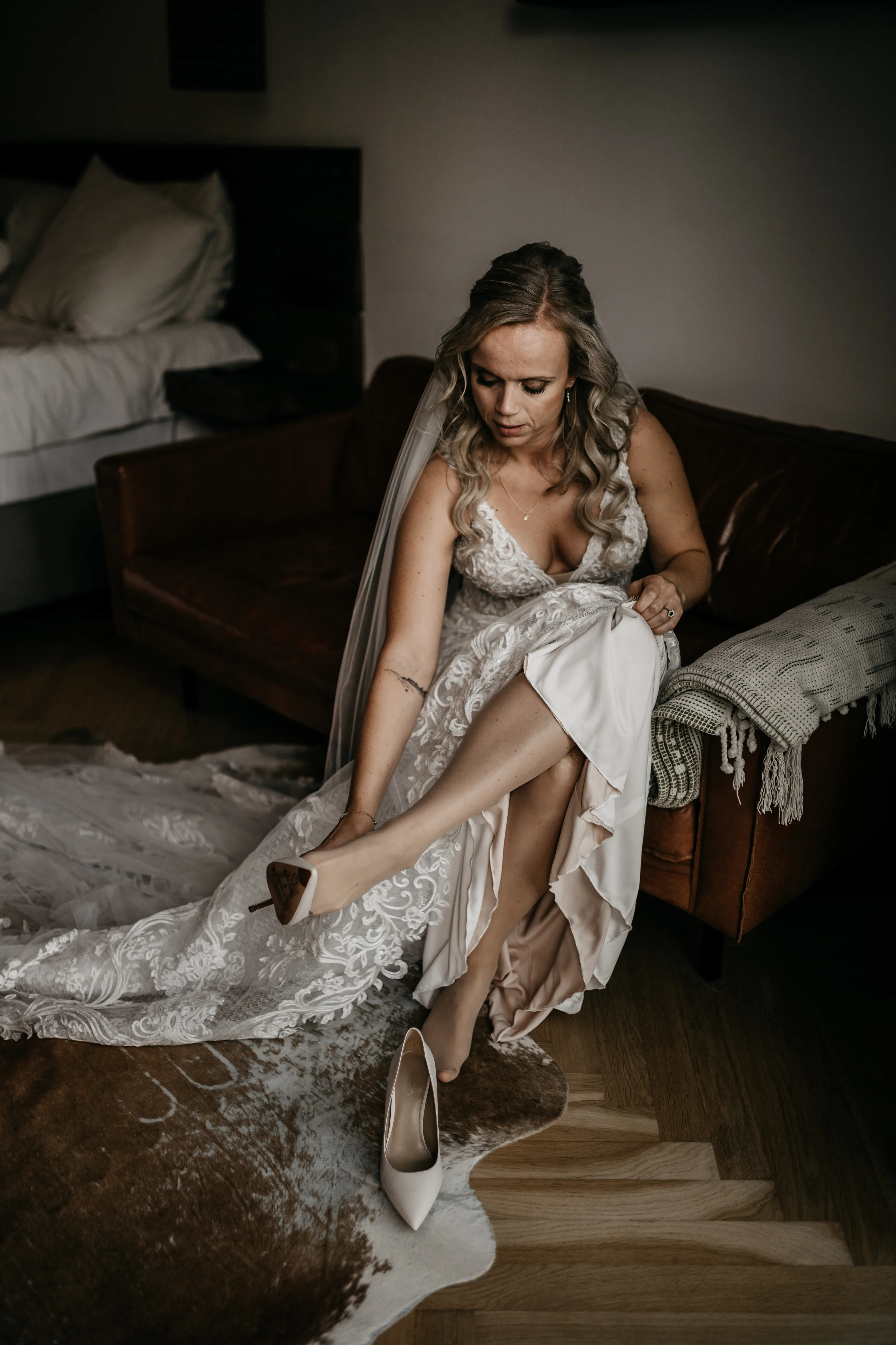 Bride Wearing Lace Fit-And-Flare Wedding Dress Called Hamilton By Sottero And Midgley Getting Ready