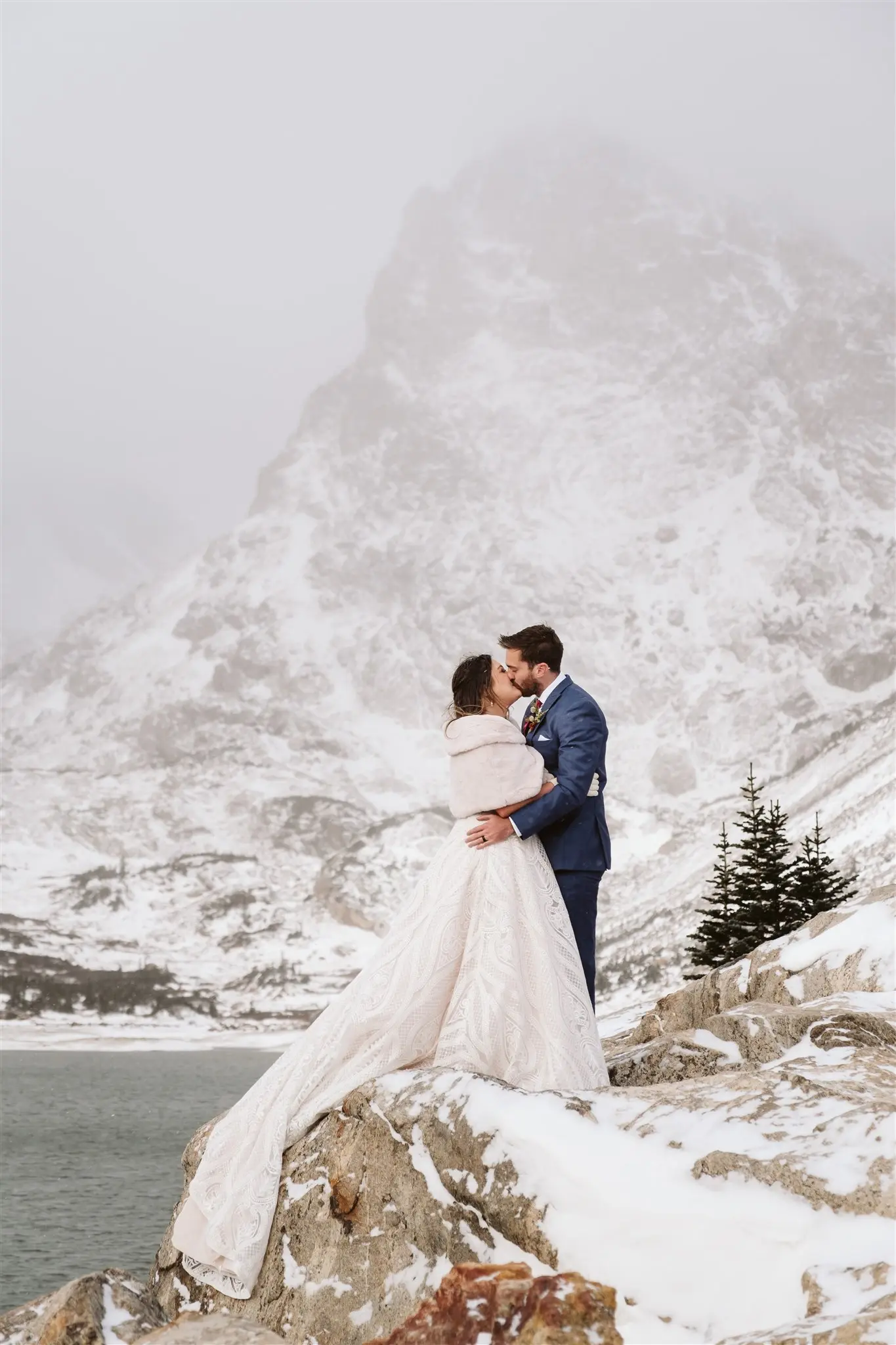 Groom Kissing Bride in Boho Princess A-line Wedding Dress with Allover Sequin Lace  Called Roxanne by Sottero & Midgley