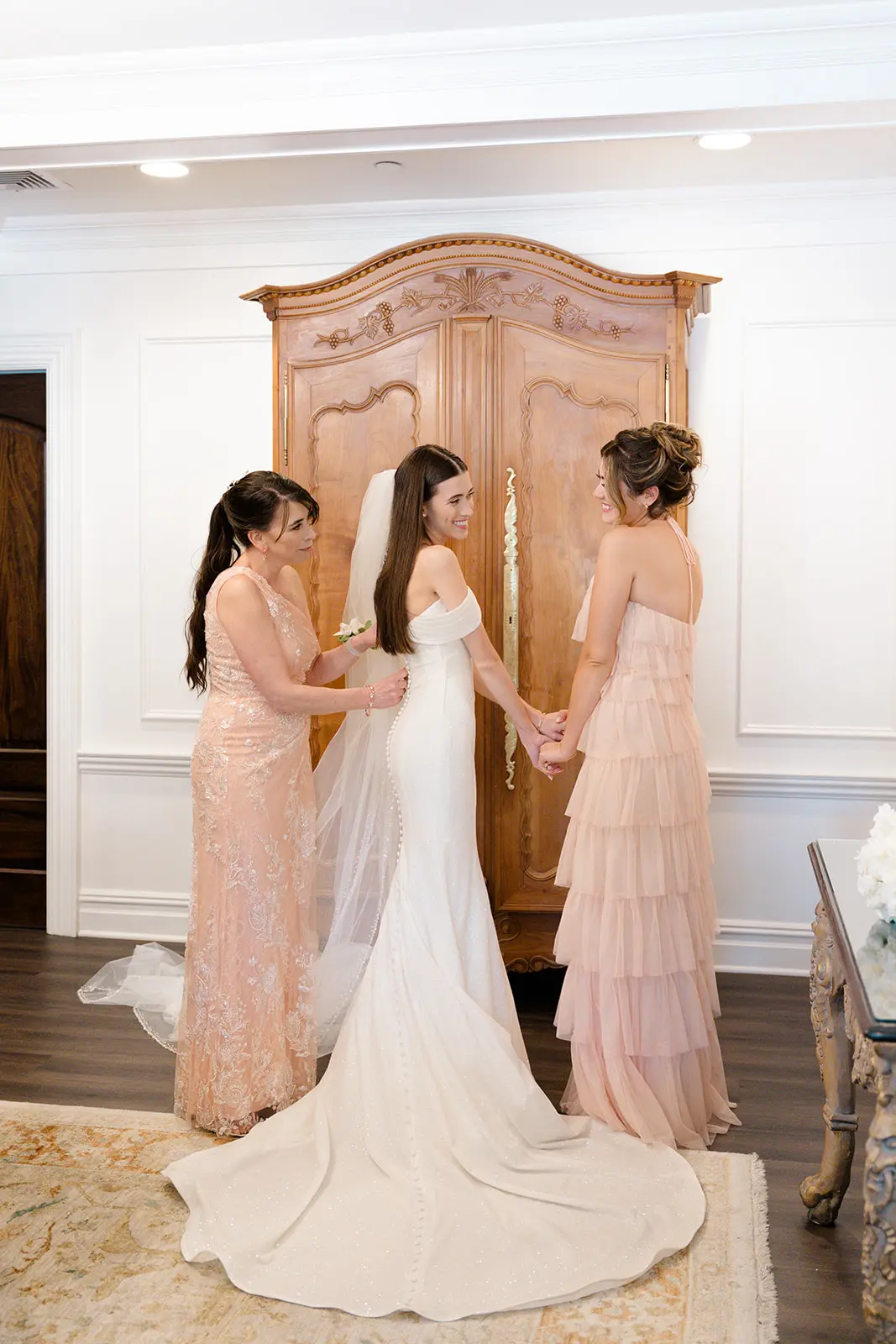 Bride wearing Anniston Lane by Maggie Sottero with her bridesmaids