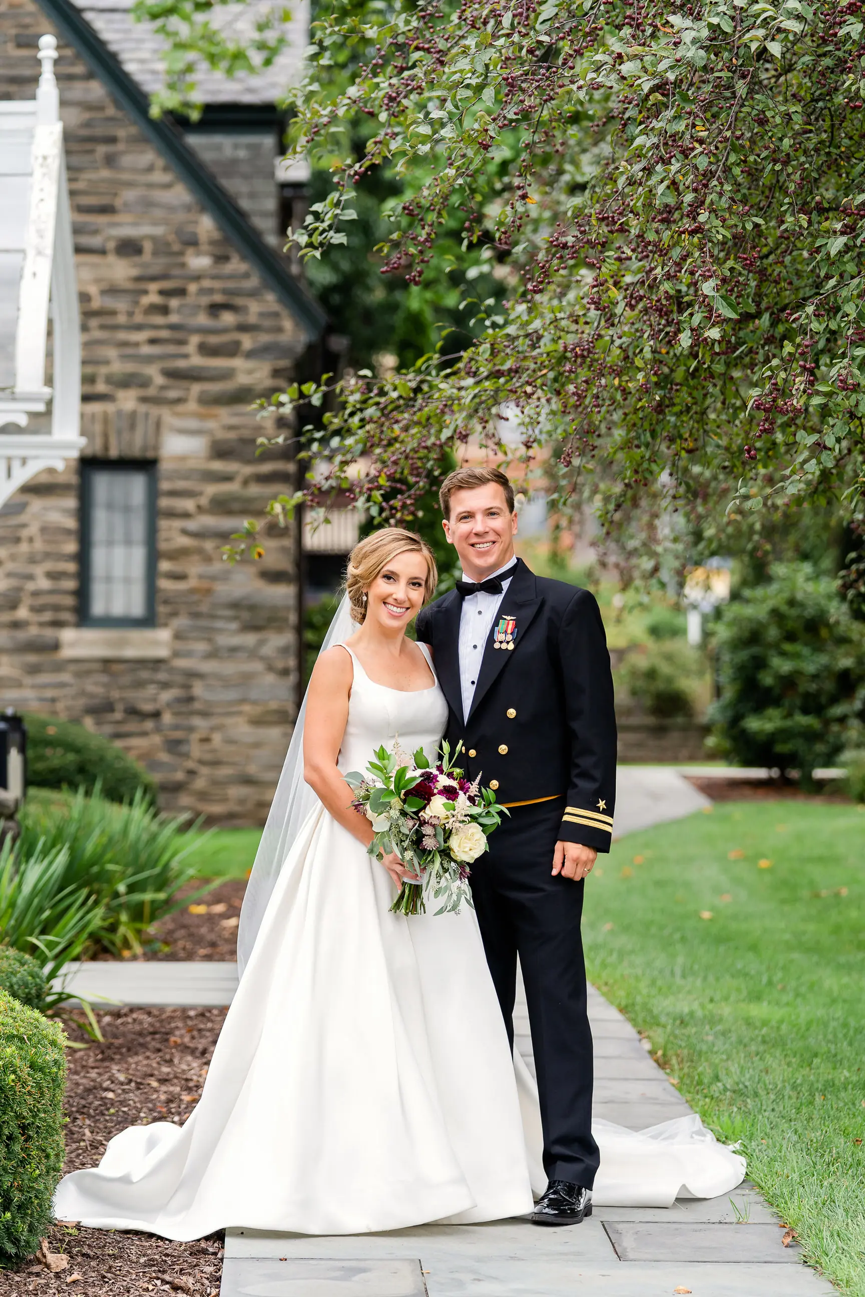 Bride wearing Simple Ballgown Wedding Dress called Selena by Maggie Sottero with the groom