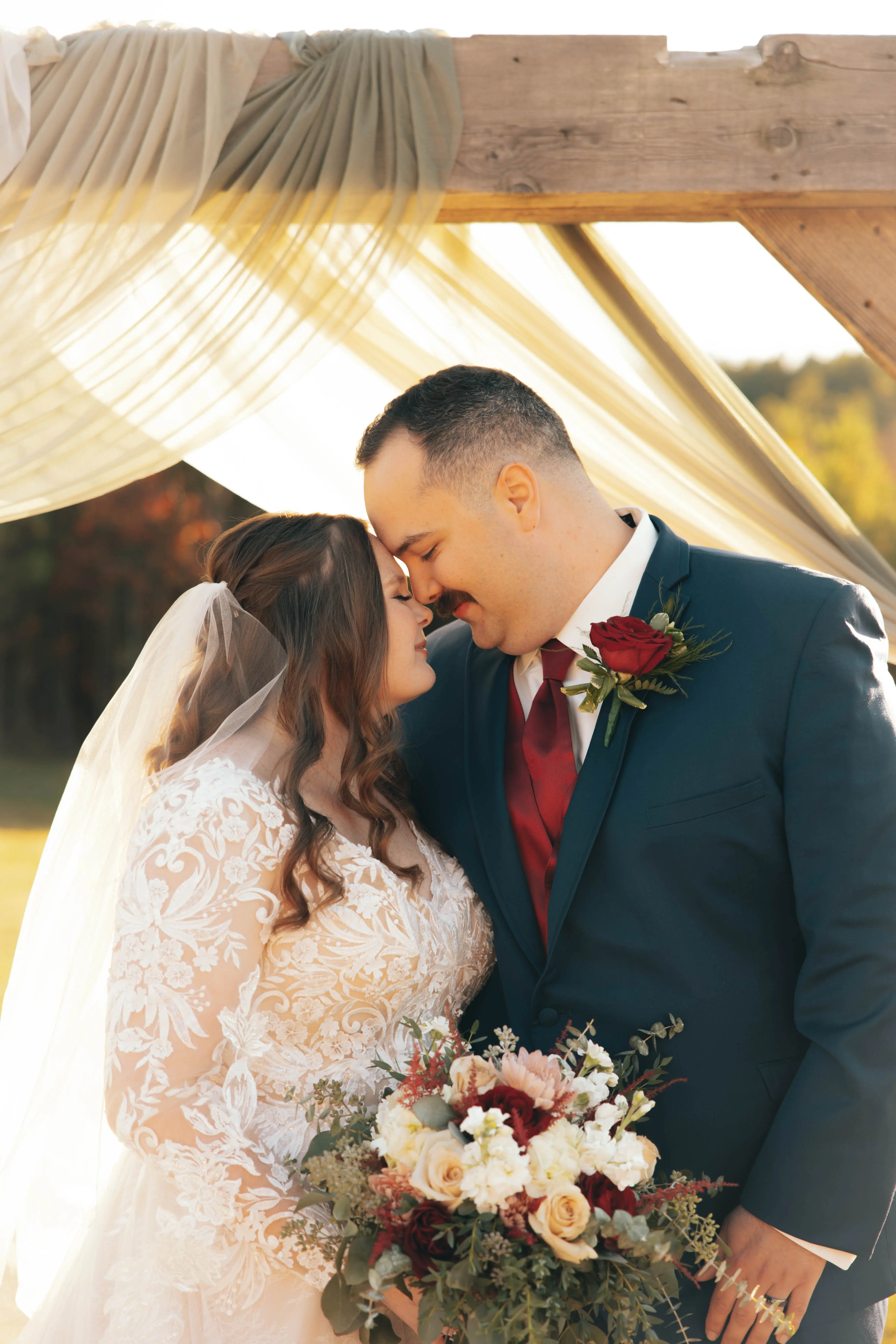 Bride wearing Zander wedding gown by Sottero and Midgley with her husband