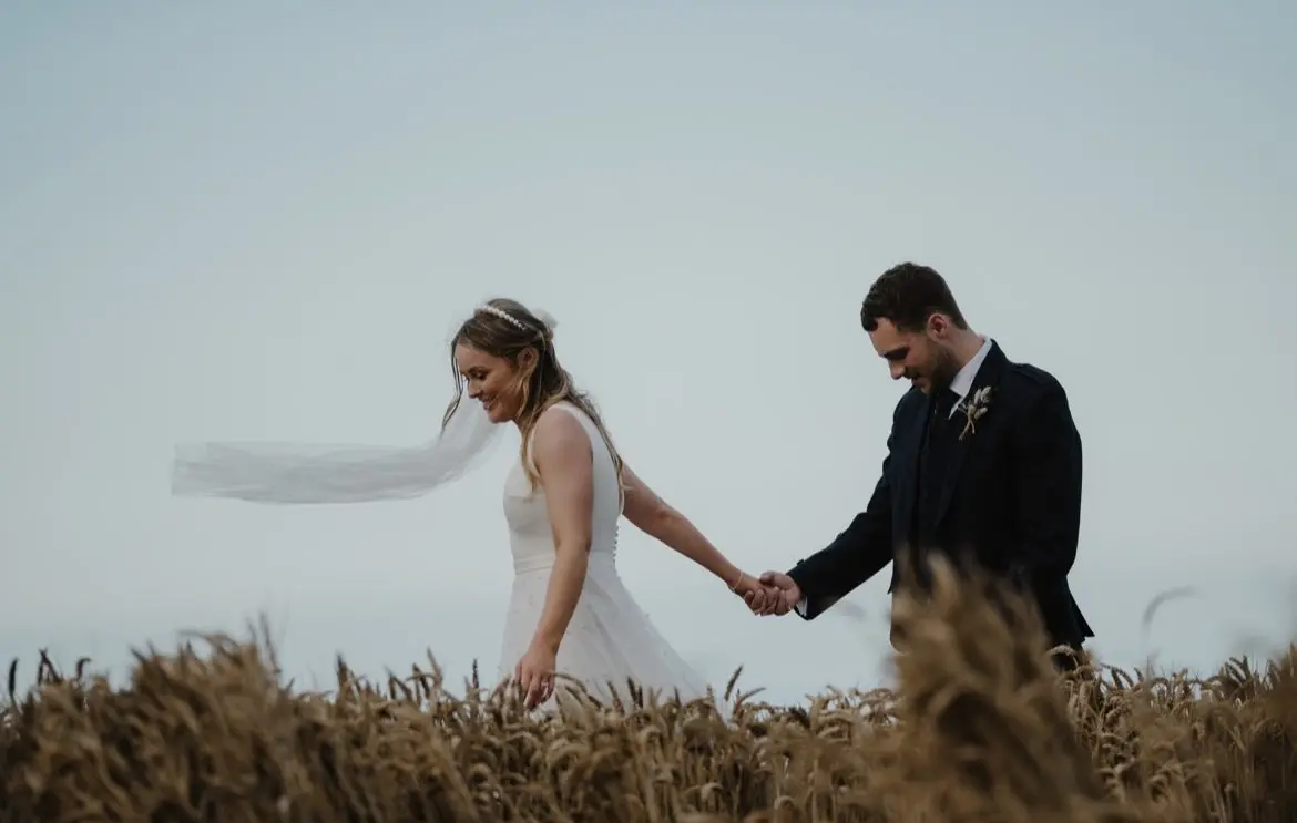 Groom With Bride In Minimalist Wedding Dress With Pearls Sahar Marie By Maggie Sottero