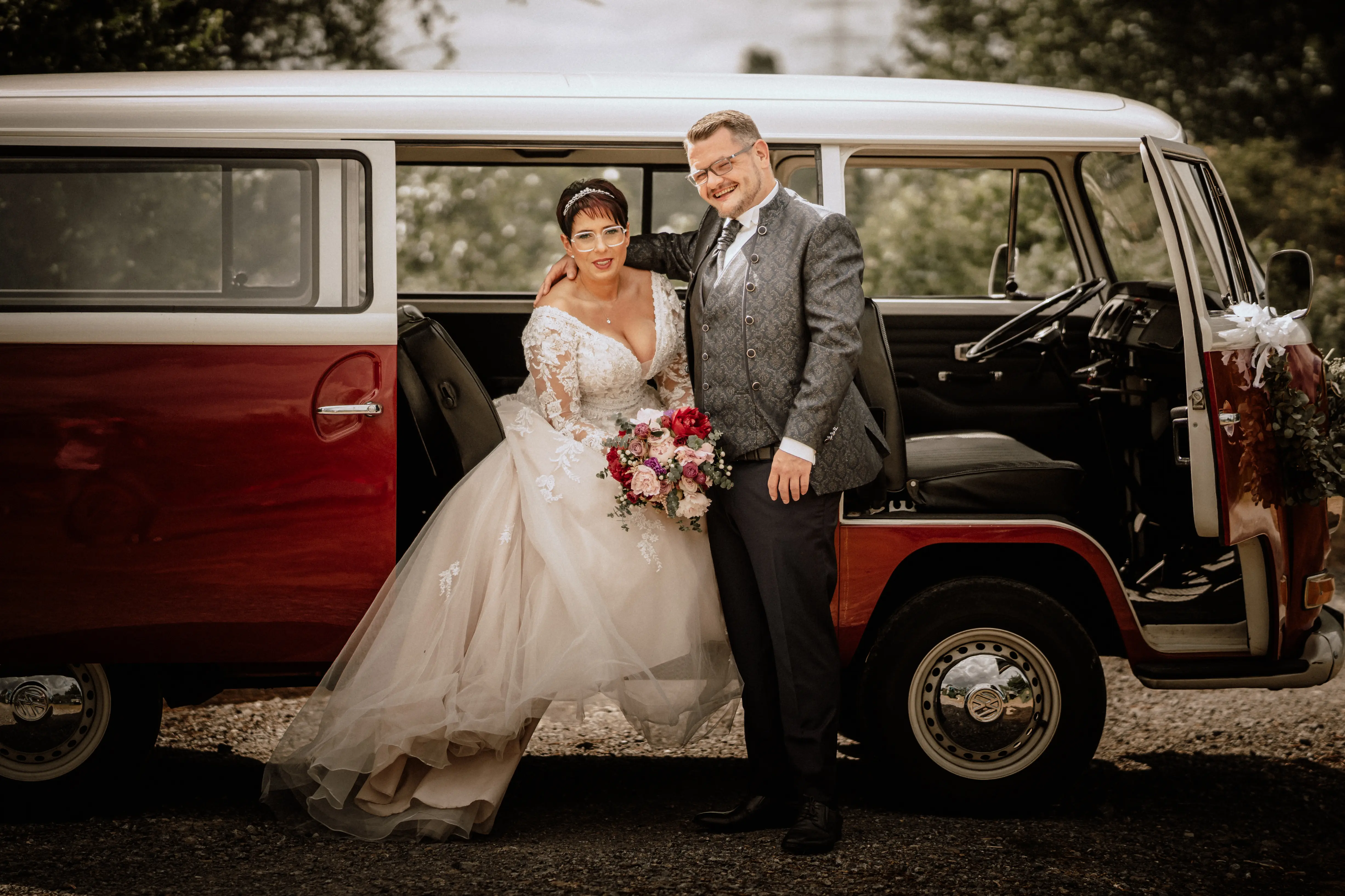 Bride in Long Sleeve Ivory Wedding Dress Raphael with Groom