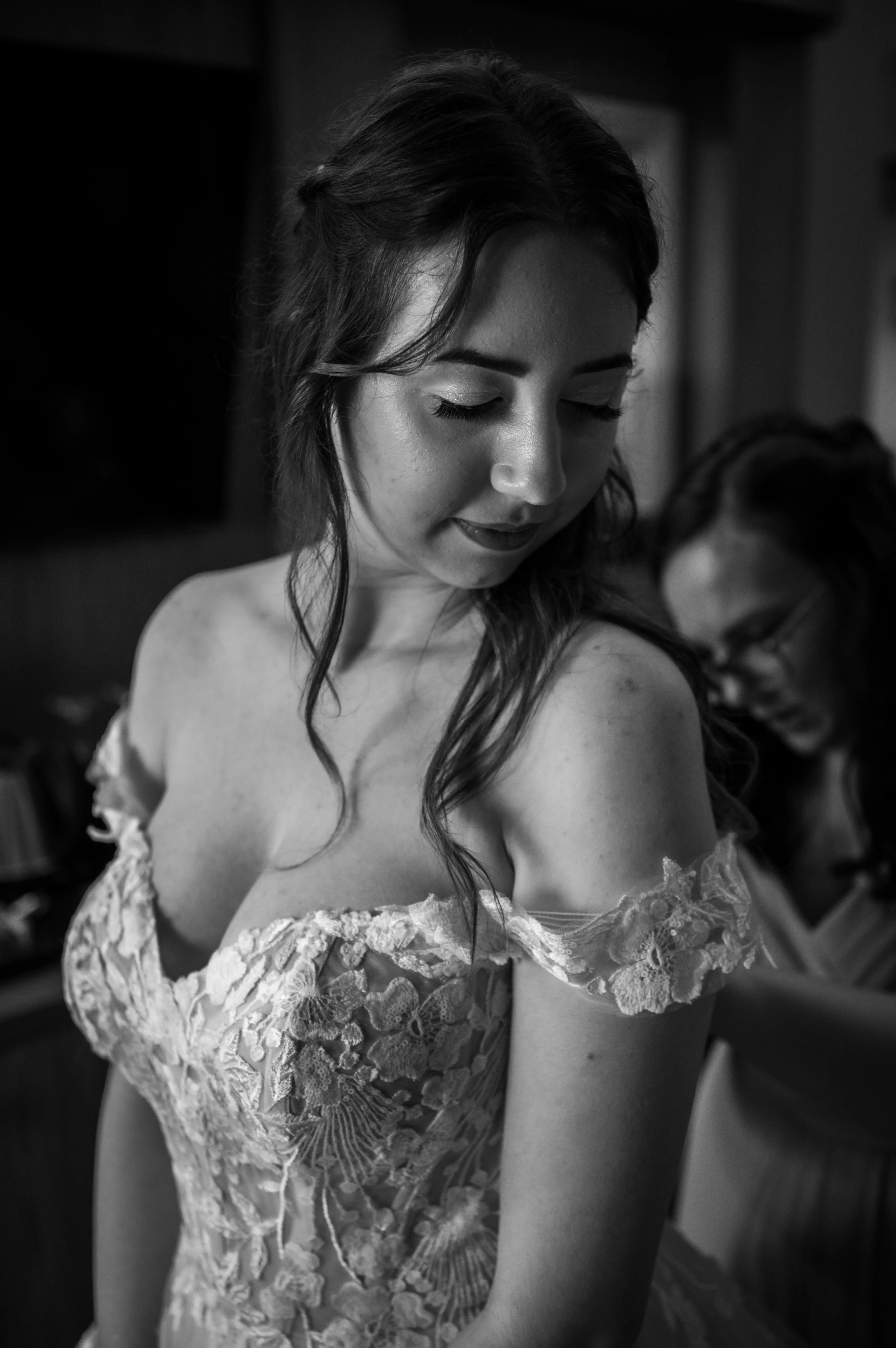 Bride wearing Harlem by Maggie Sottero being buttoned up