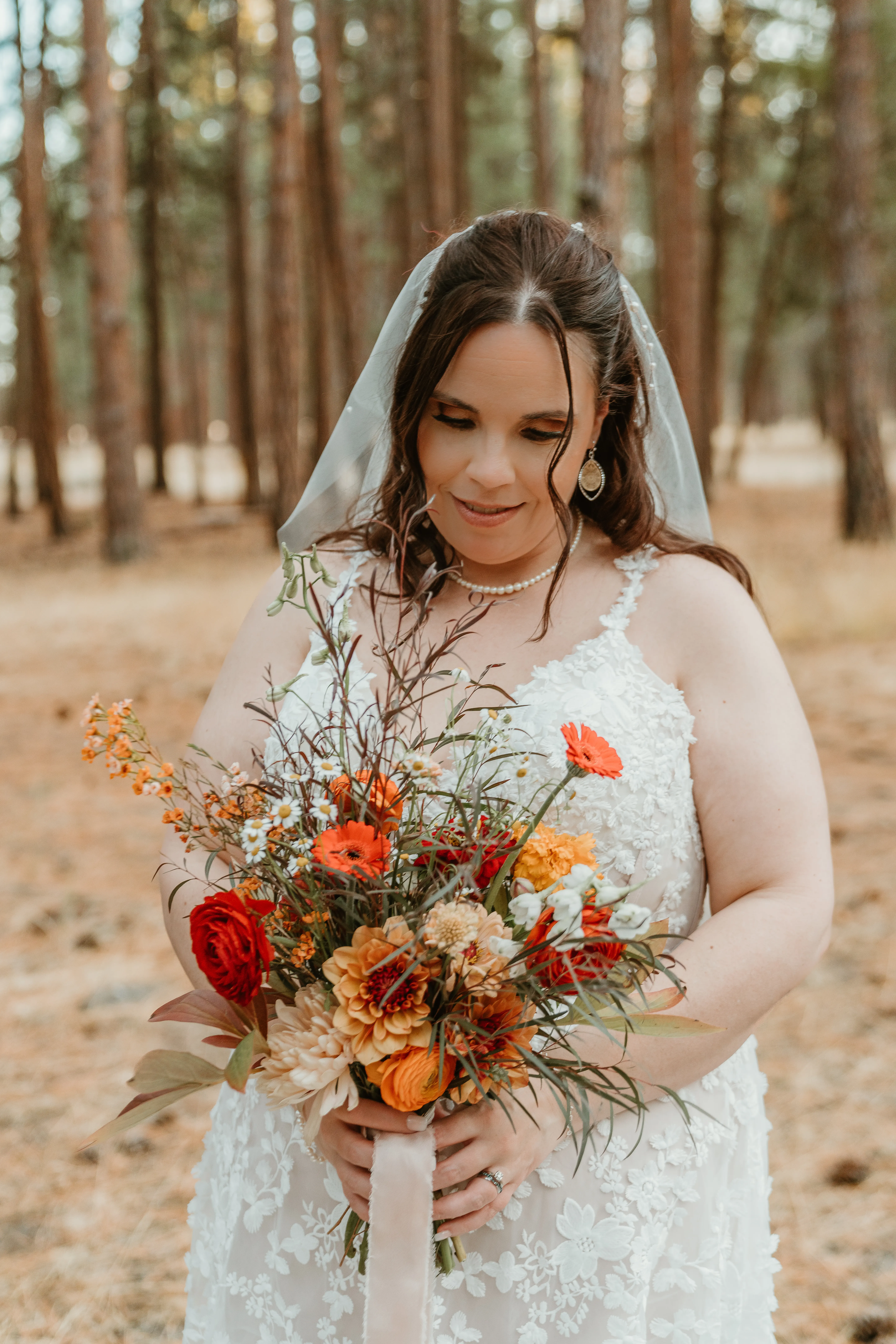 Bride Wearing Lace Wedding Dress Called Ladonna By Maggie Sottero With A Fall Color Bouquet